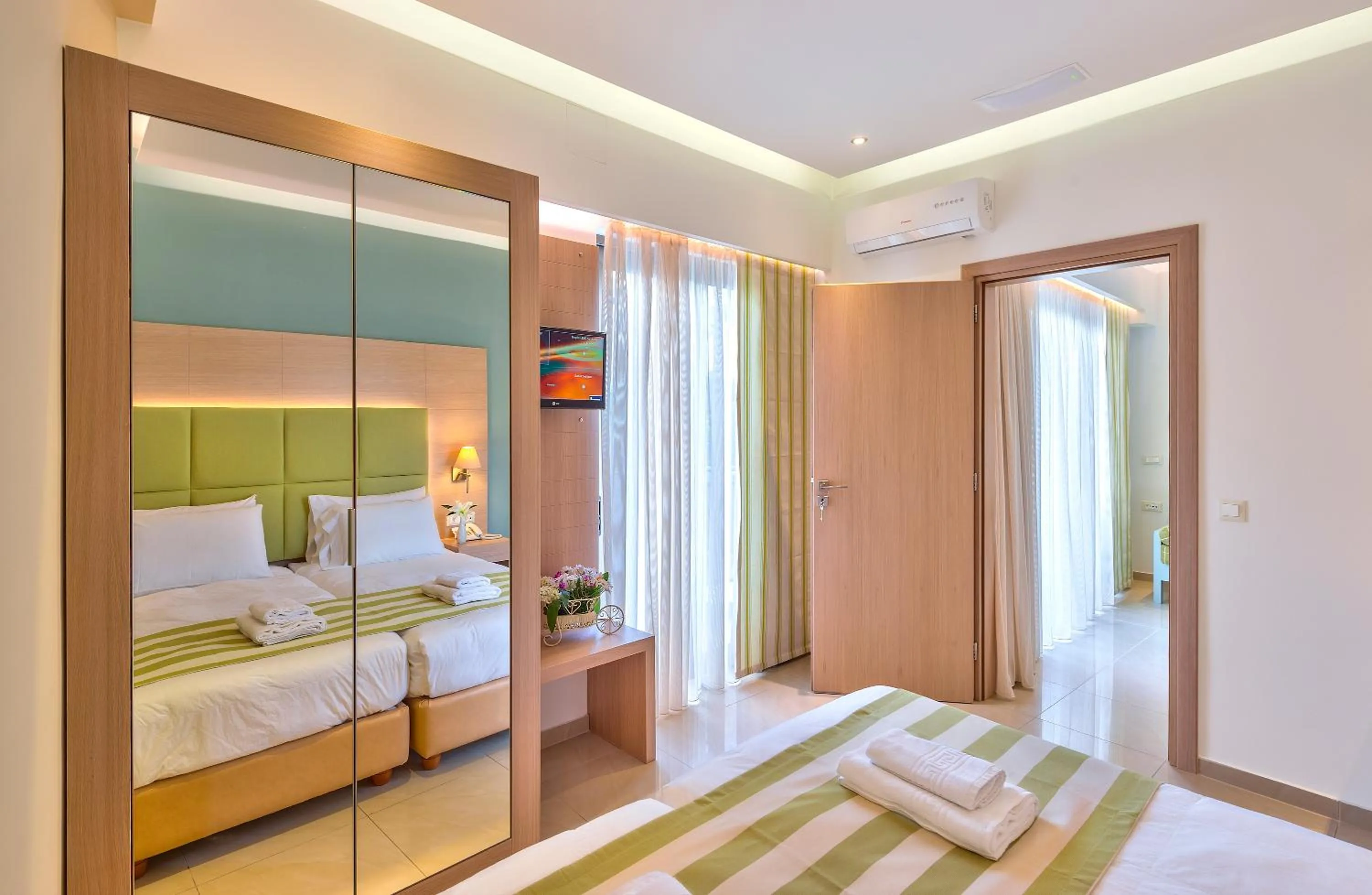 Bed in Leonidas Hotel & Apartments