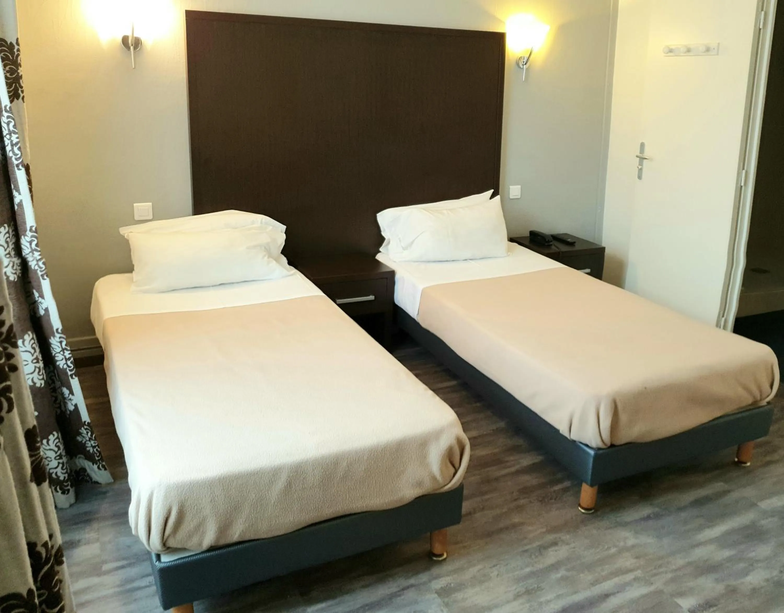 Photo of the whole room, Bed in Brit Hotel Confort Auclair