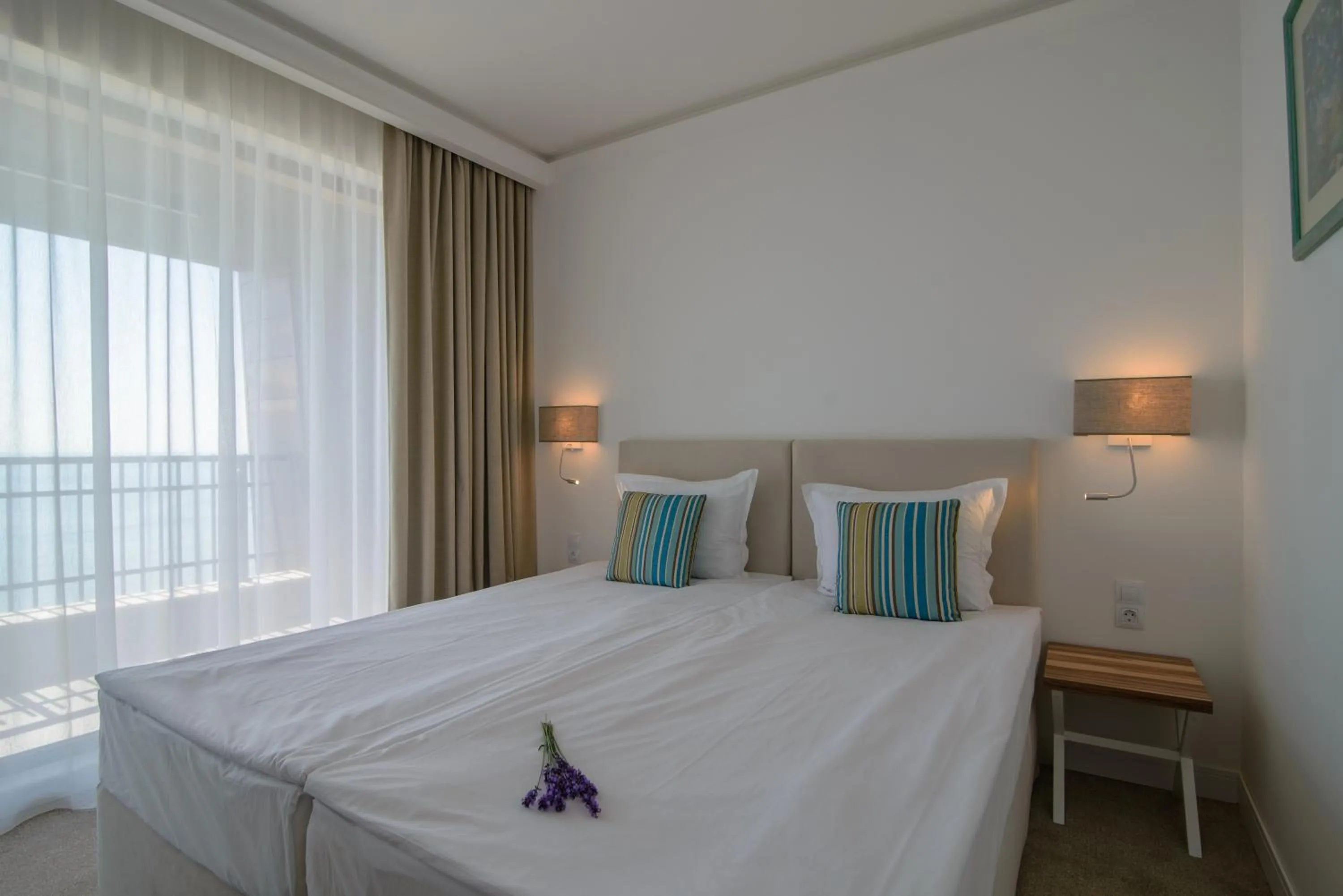 Bedroom, Bed in HVD Nympha Hotel - Adults Only - Private Beach & Free Parking