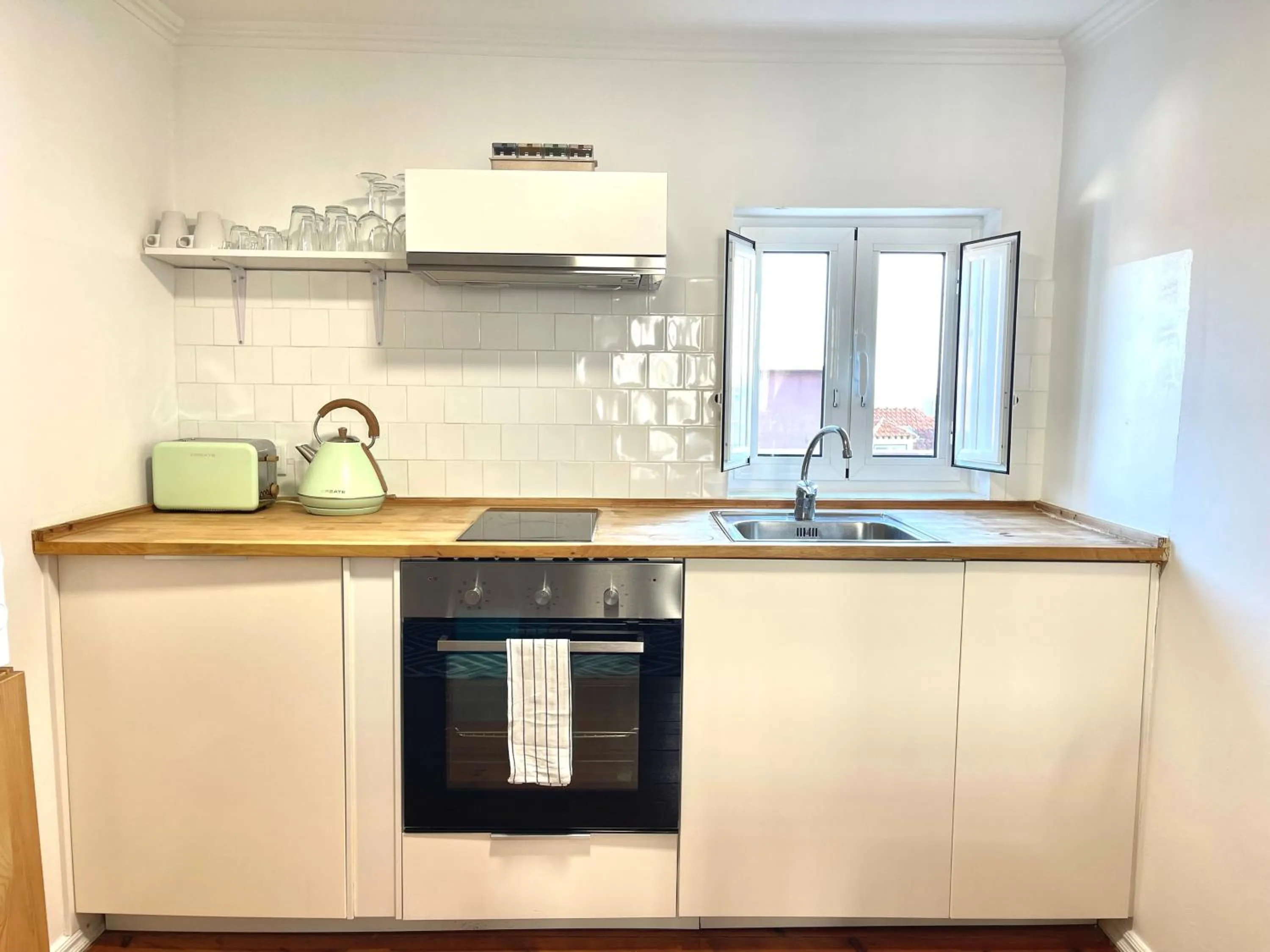 kitchen in Apartments Center Alfama