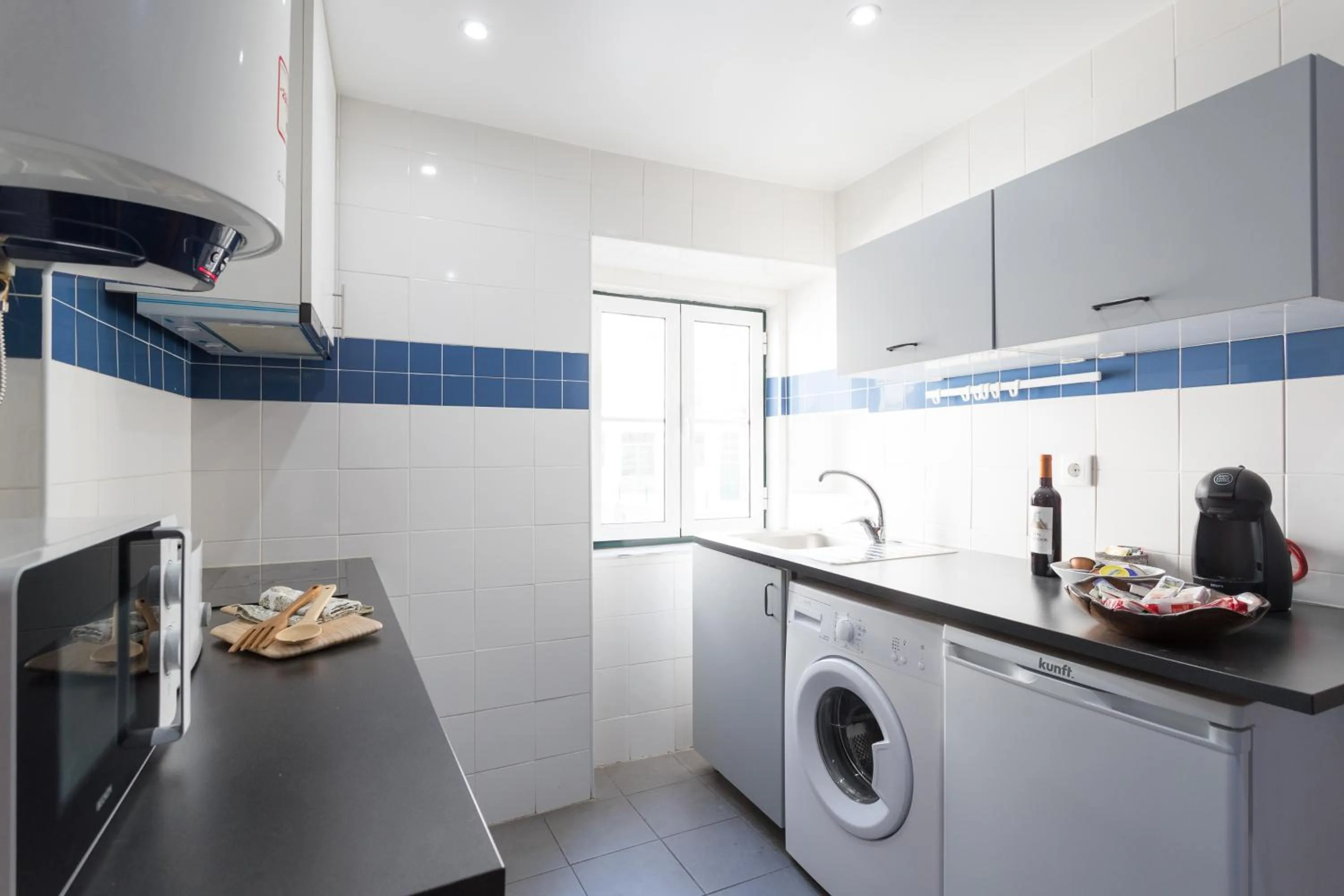 kitchen in Apartments Center Alfama