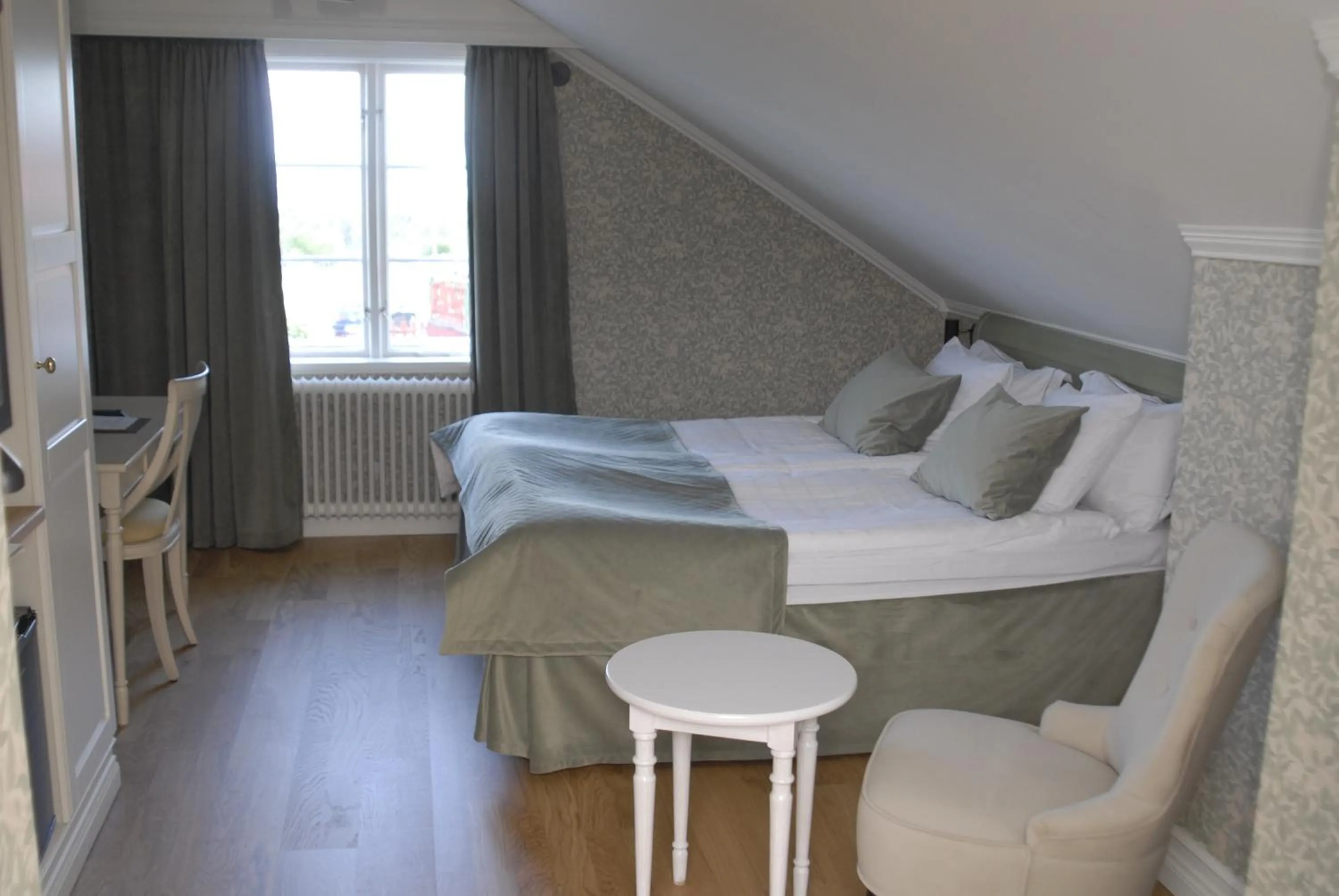 Property building, Bed in Tällbergsgårdens Hotell