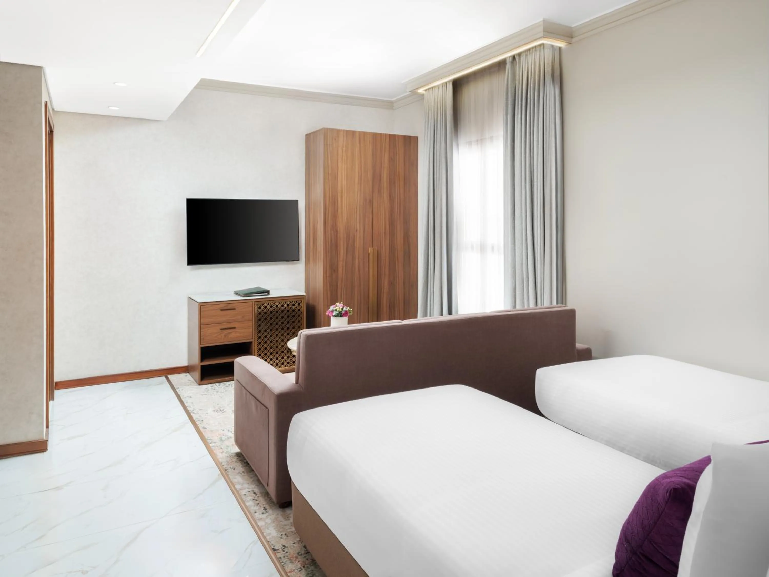 Living room, Bed in Elaf Taiba Hotel