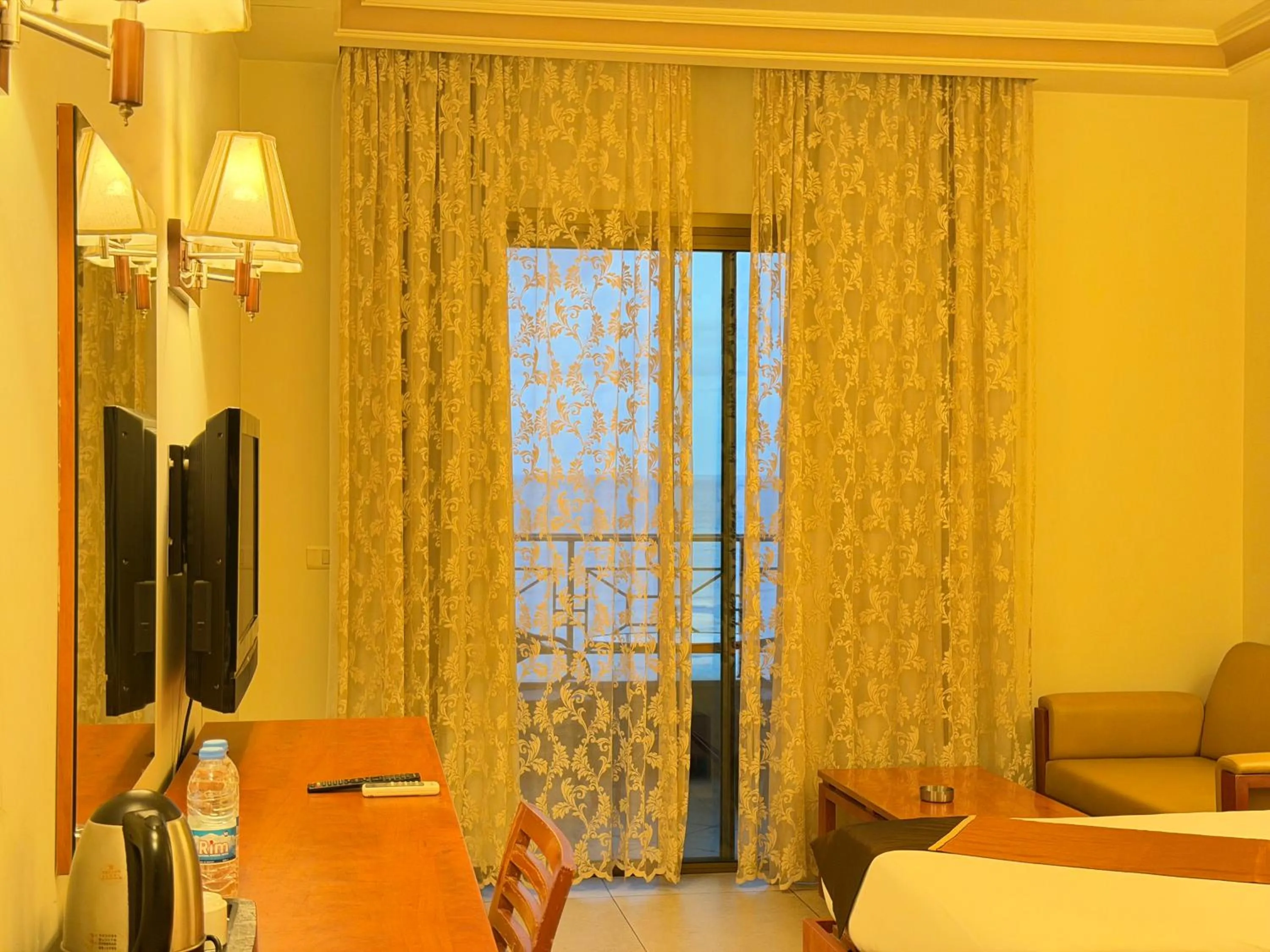 Seating area, Bed in Princessa Hotel