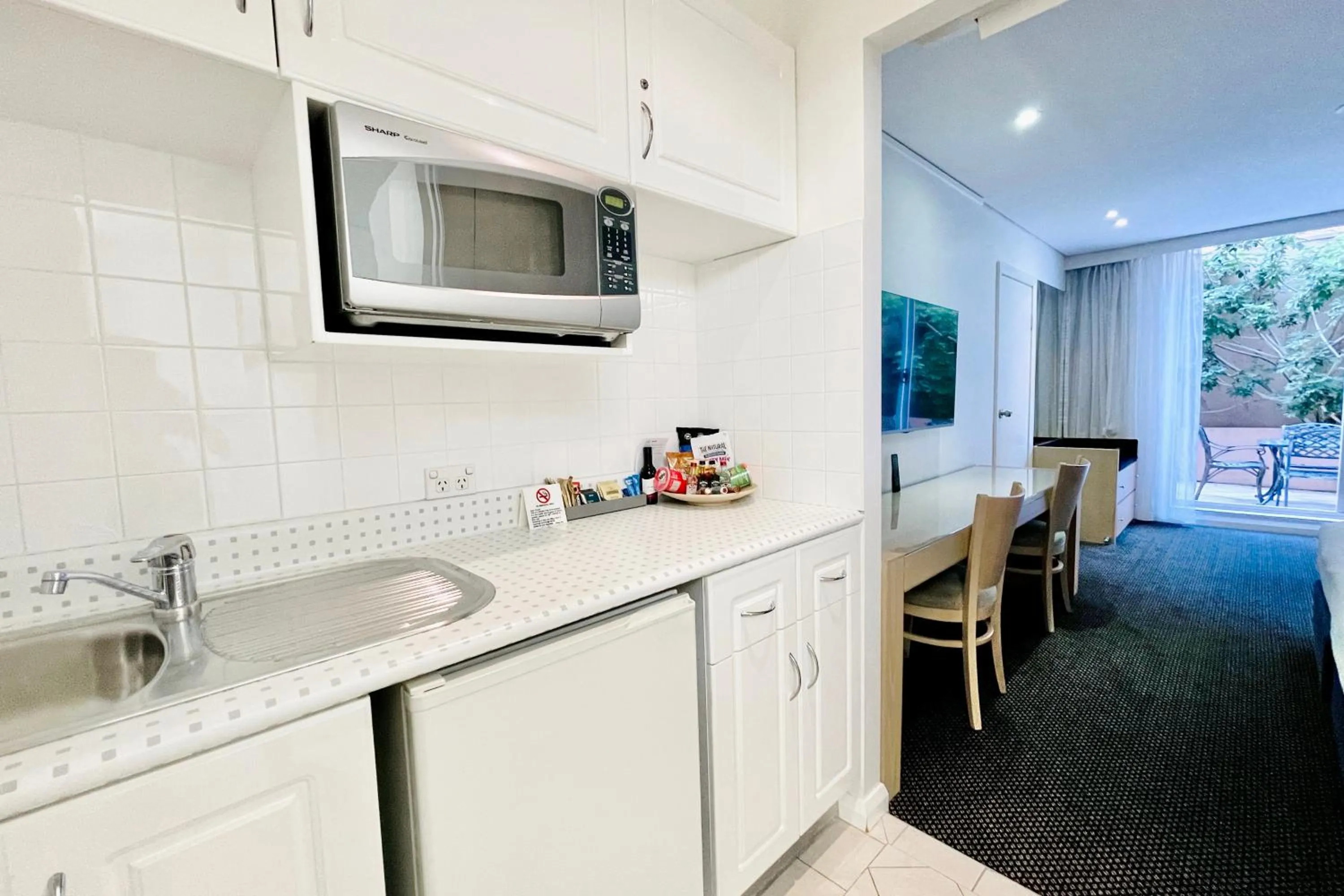 Kitchen or kitchenette in Coogee Sands Hotel & Apartments
