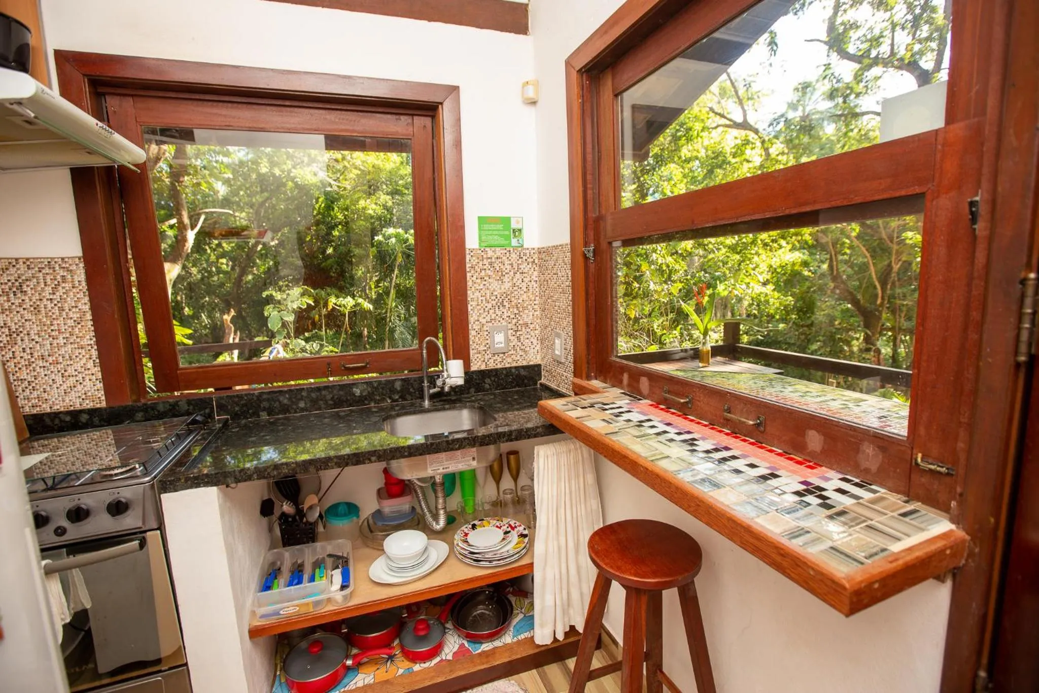 Kitchen or kitchenette in Recanto dos Pássaros Zen Apartamentos em meio de Natureza