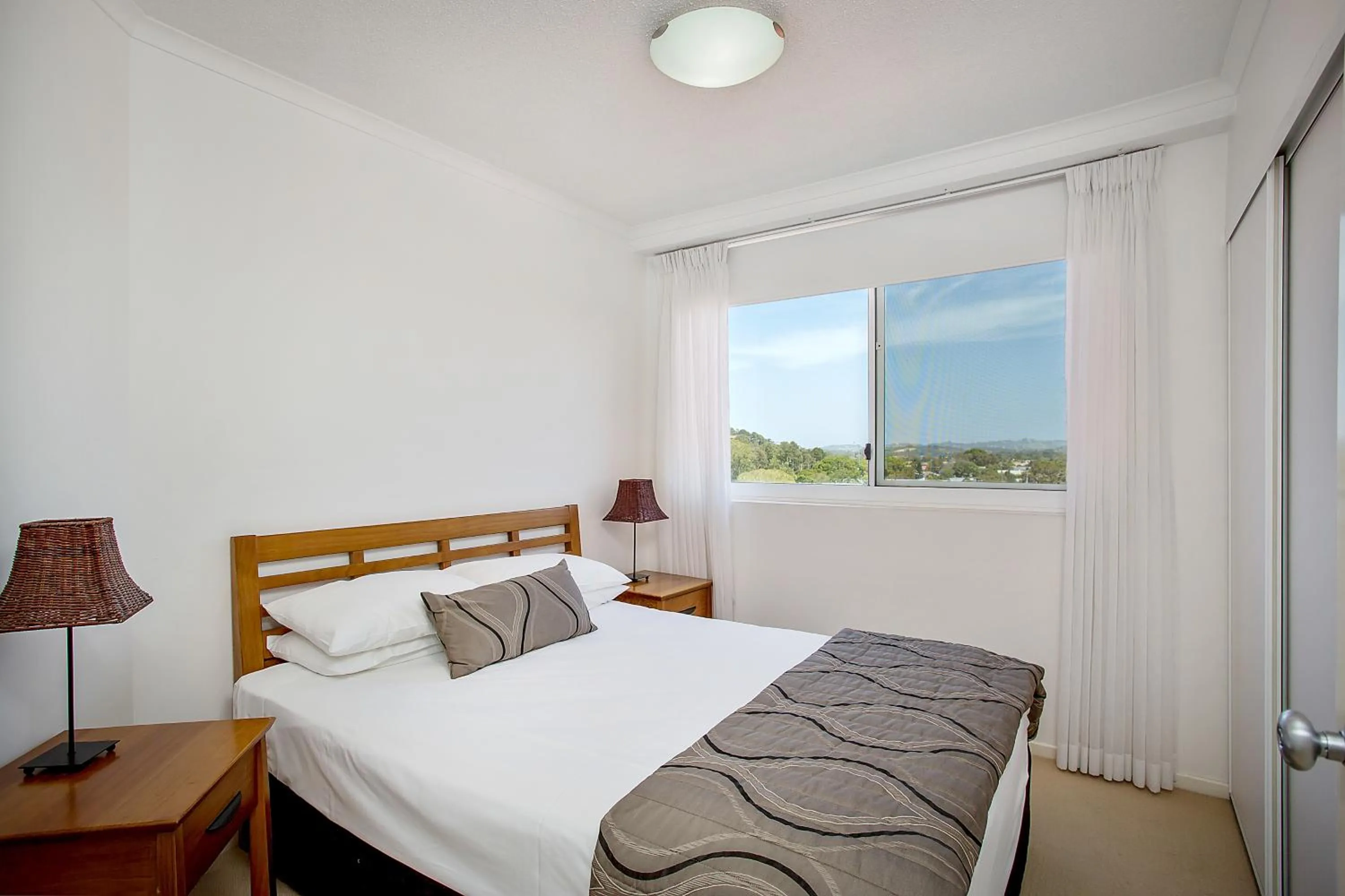 Bed in Kirra Beach Apartments
