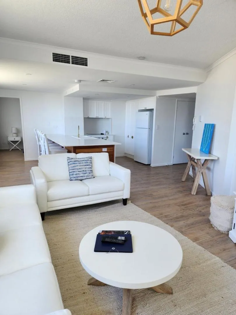 Living room, Bed in Kirra Beach Apartments