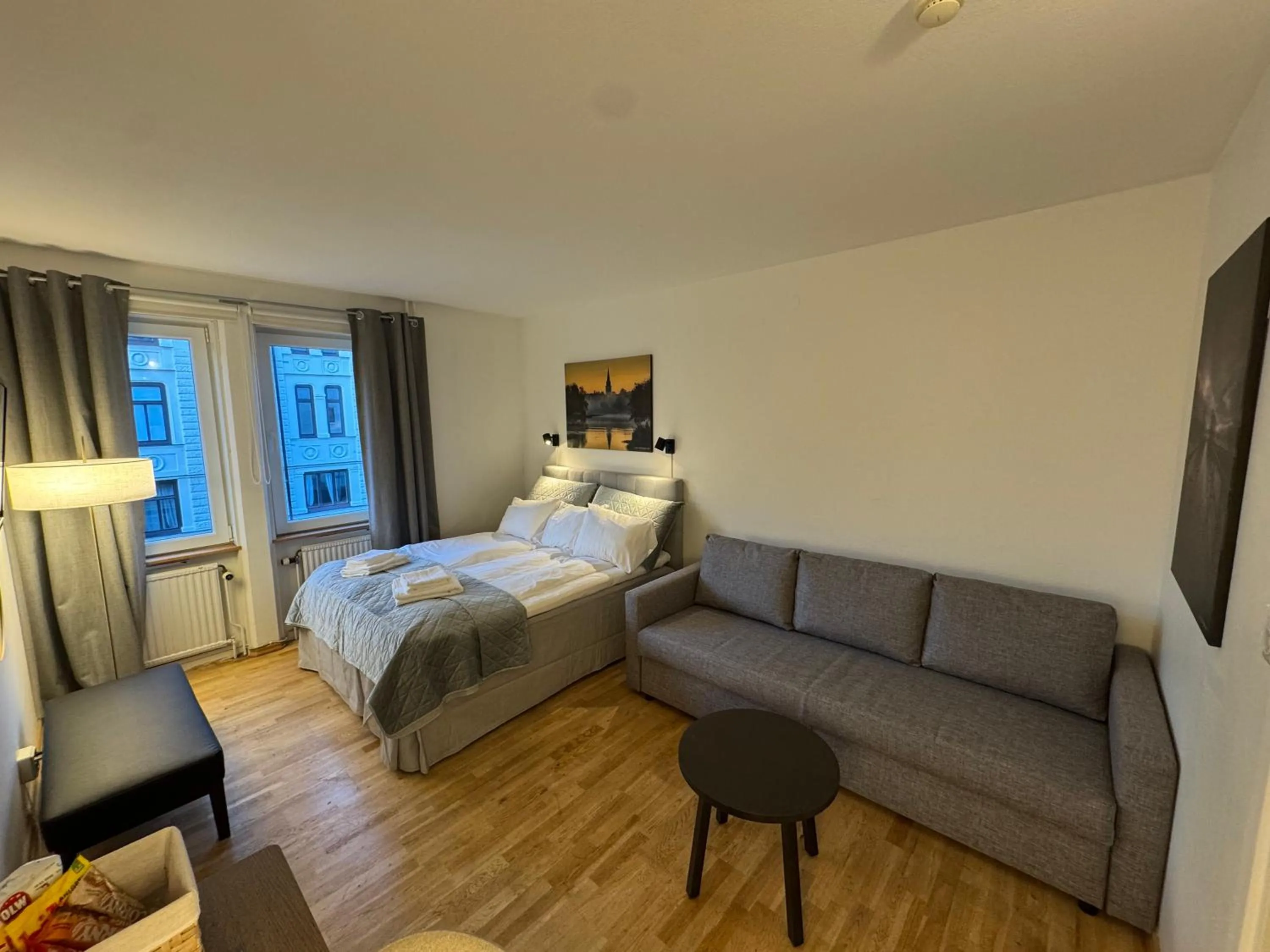 Seating area, Bed in Solsta Hotell