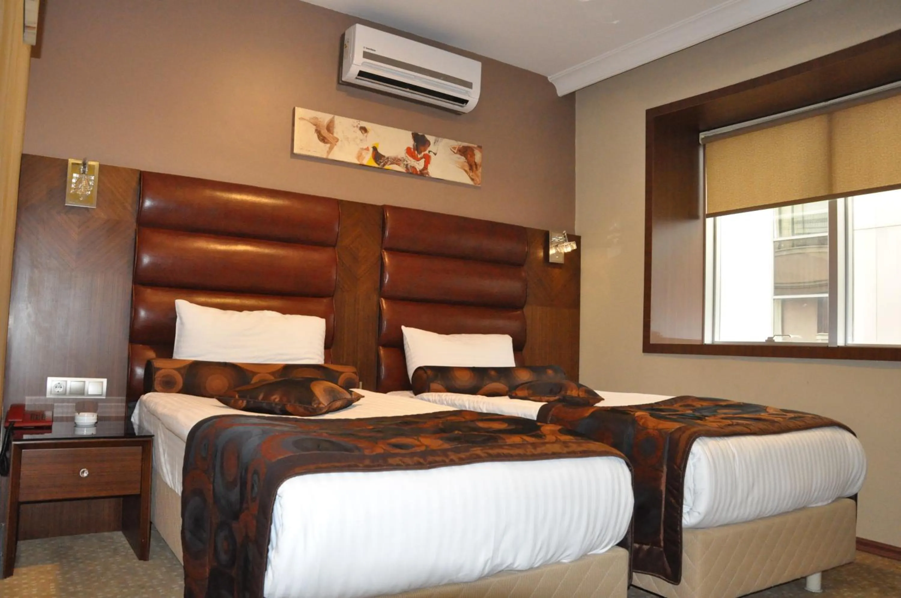 Bed in Marlight Boutique Hotel