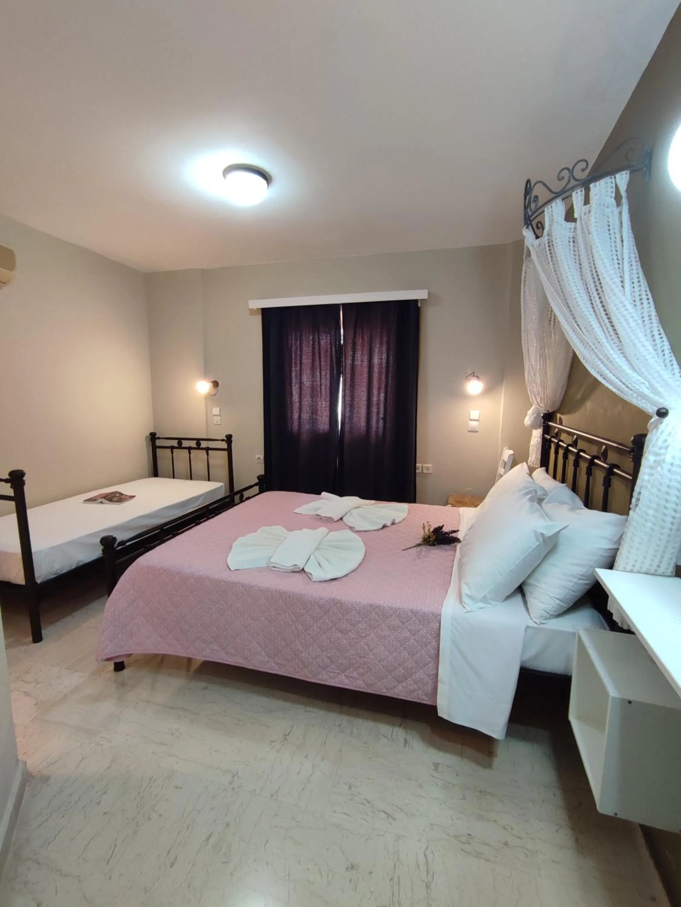 Bed in Vassiliki Bay Hotel