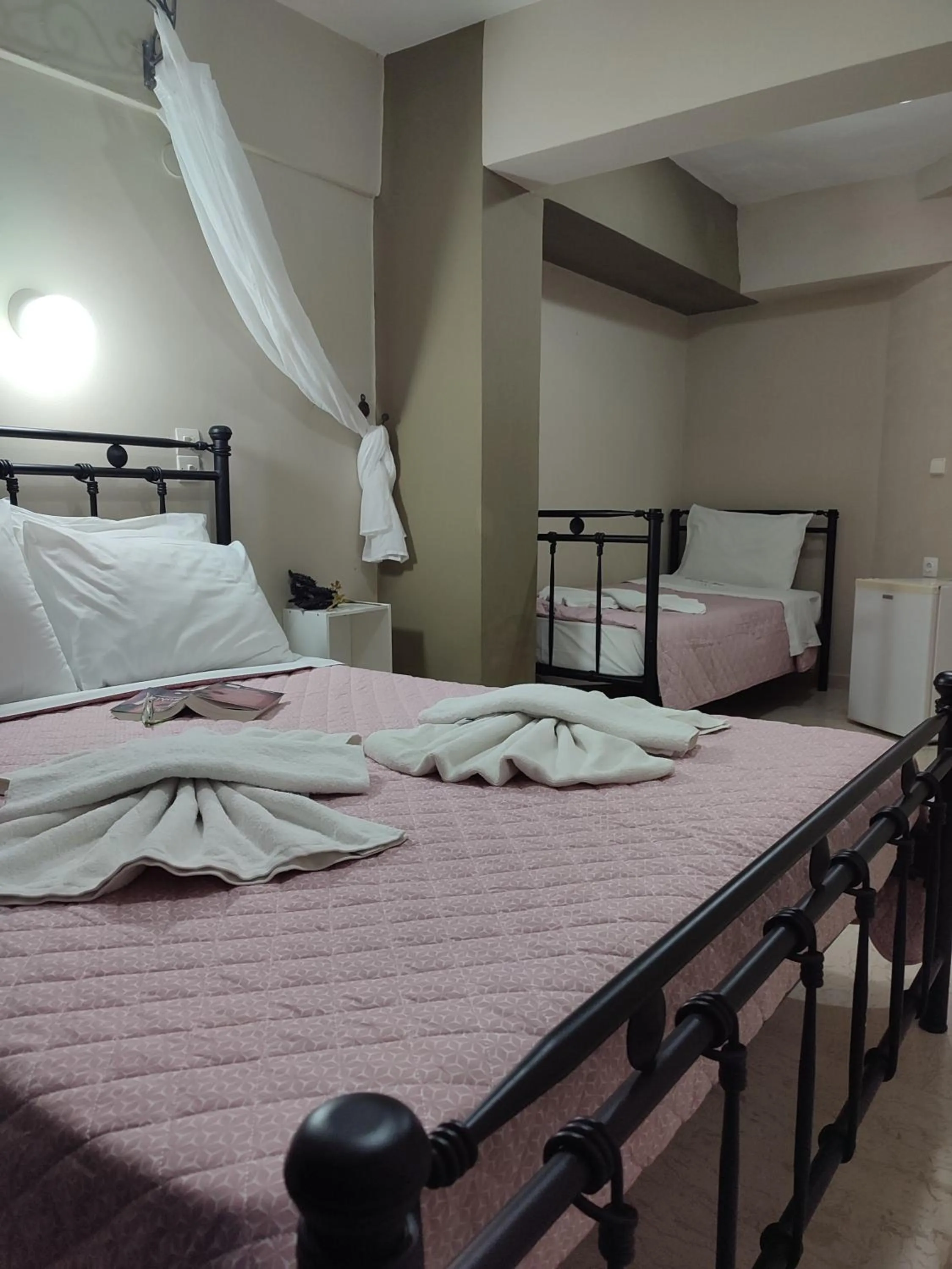 Bed in Vassiliki Bay Hotel