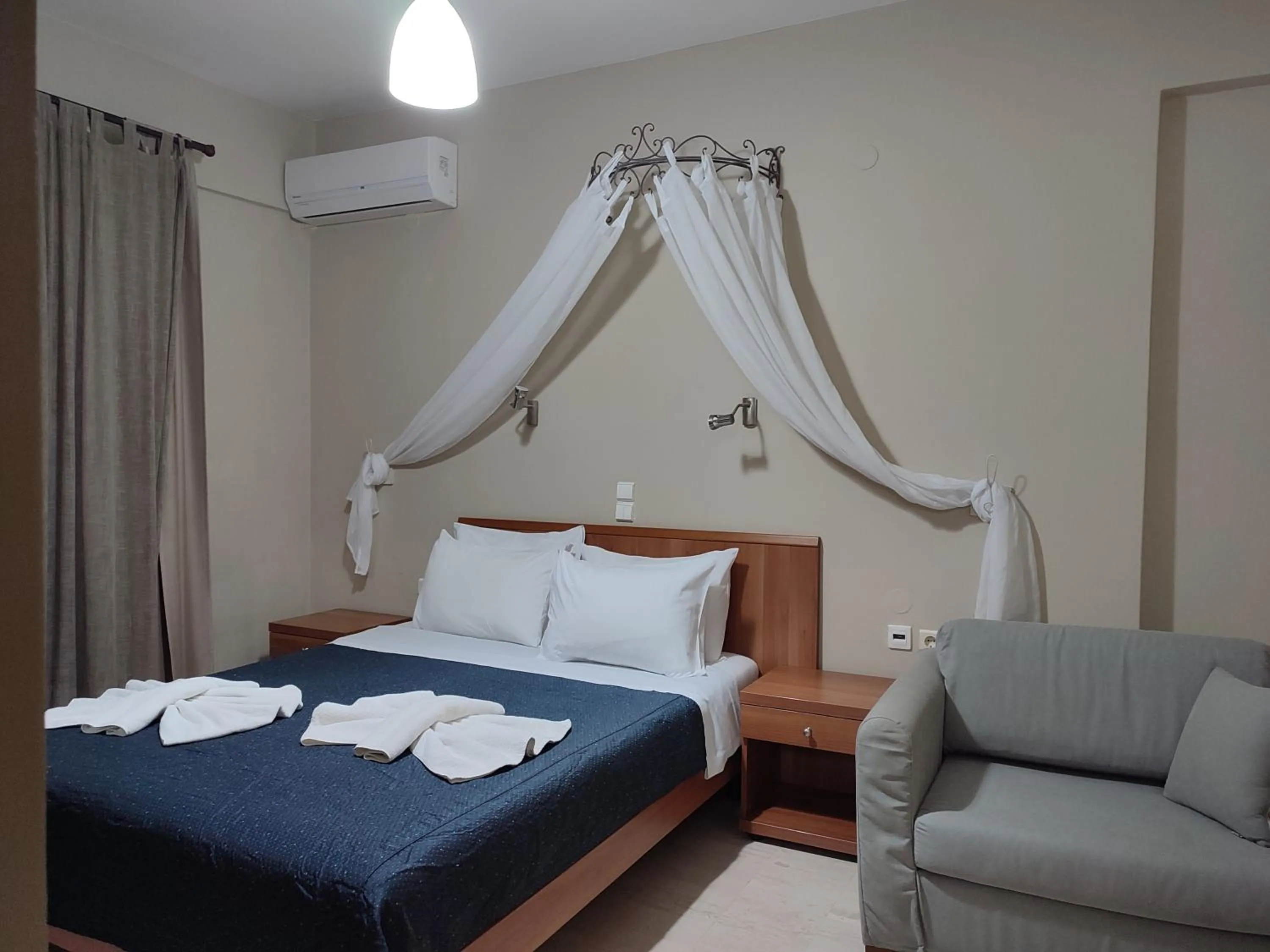 Bed in Vassiliki Bay Hotel