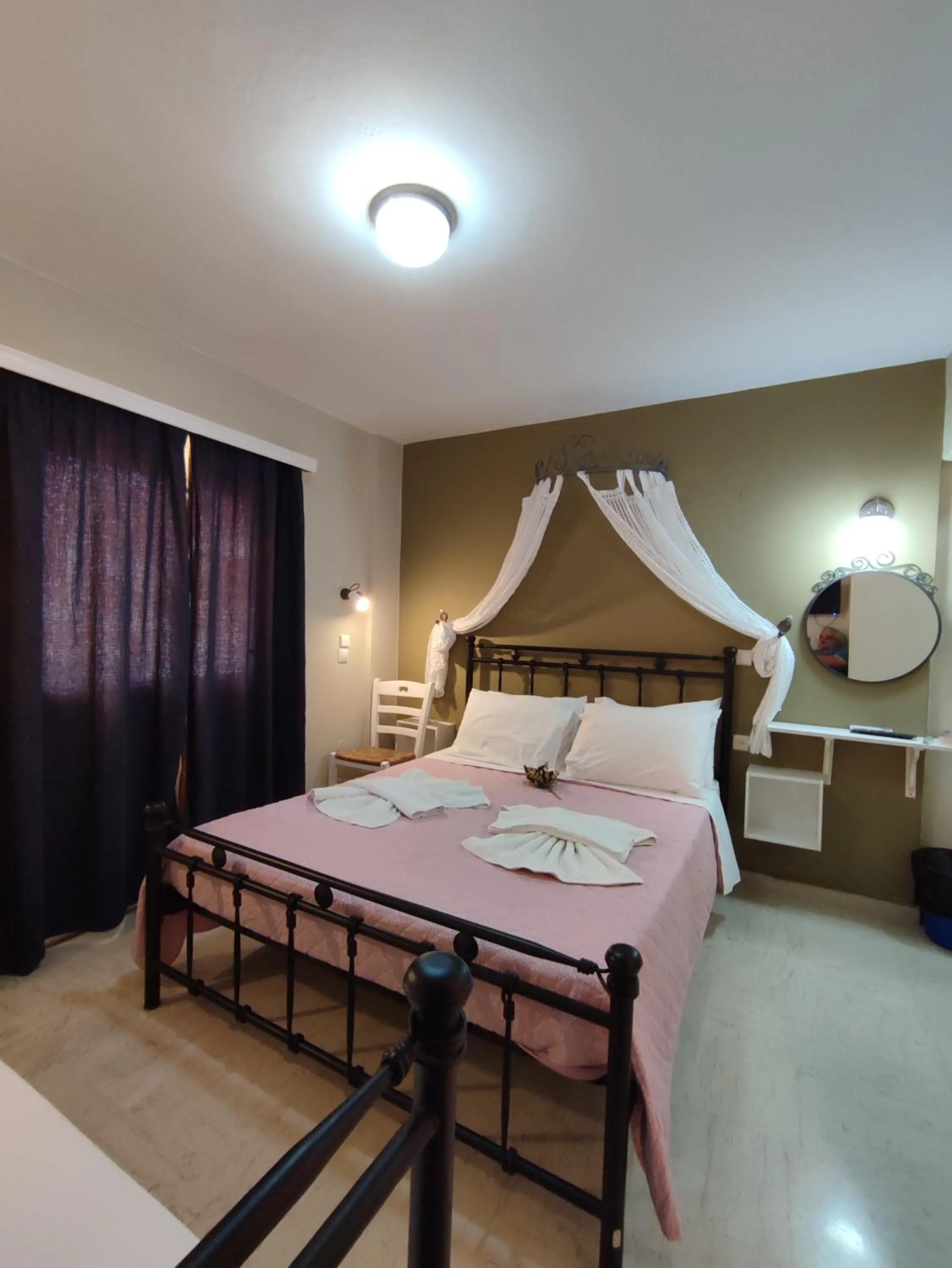 Bed in Vassiliki Bay Hotel