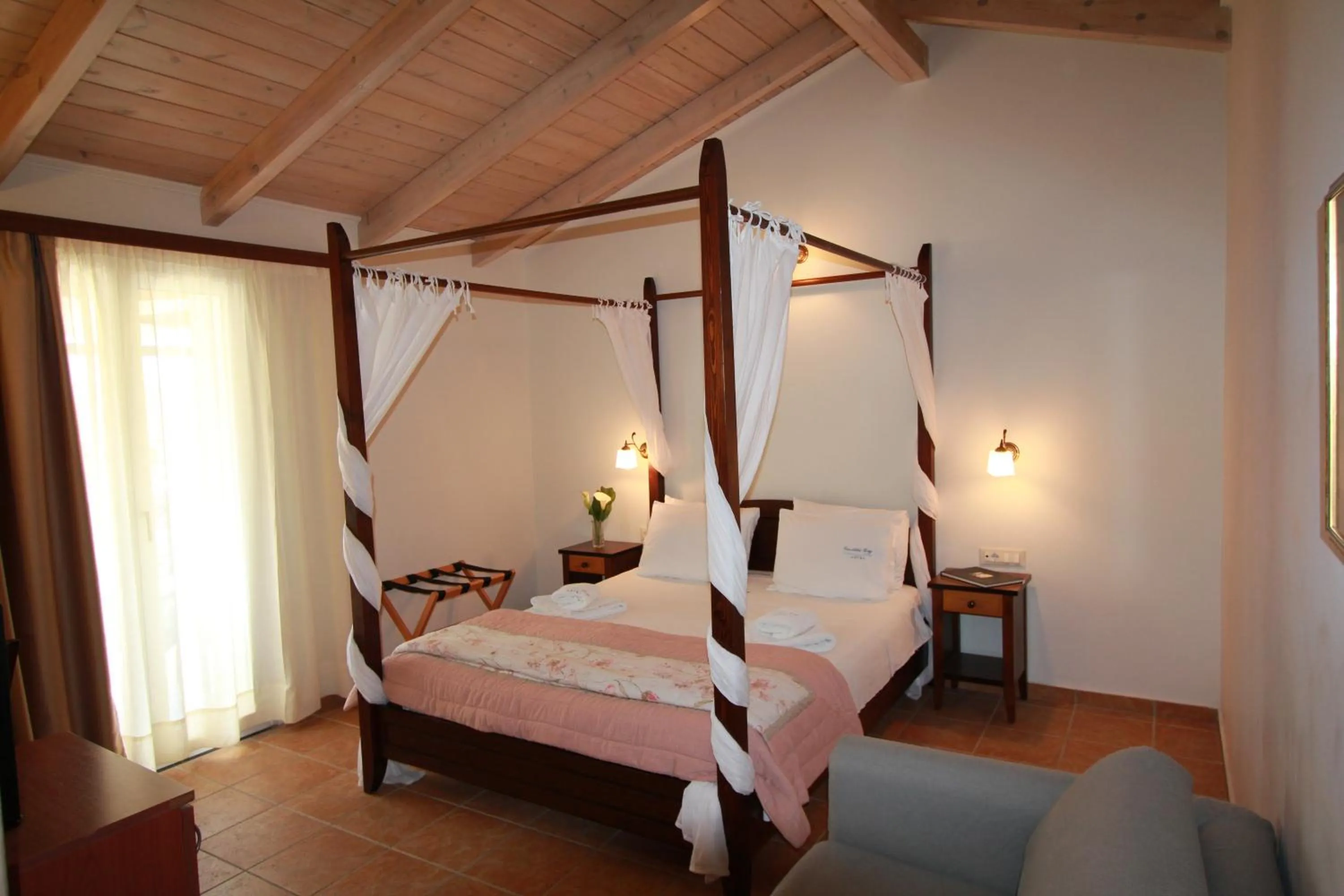 Bed in Vassiliki Bay Hotel