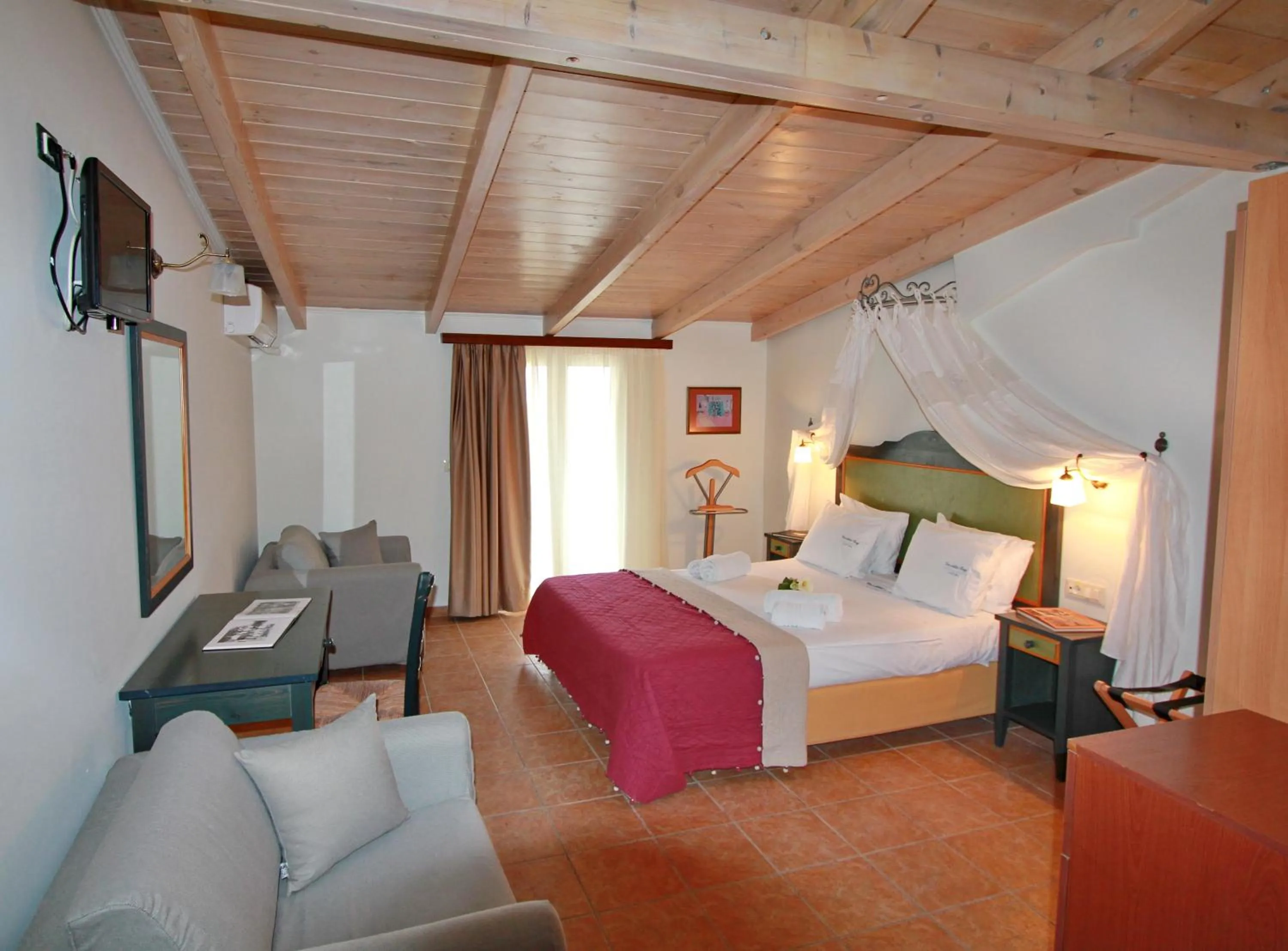 Photo of the whole room, Bed in Vassiliki Bay Hotel