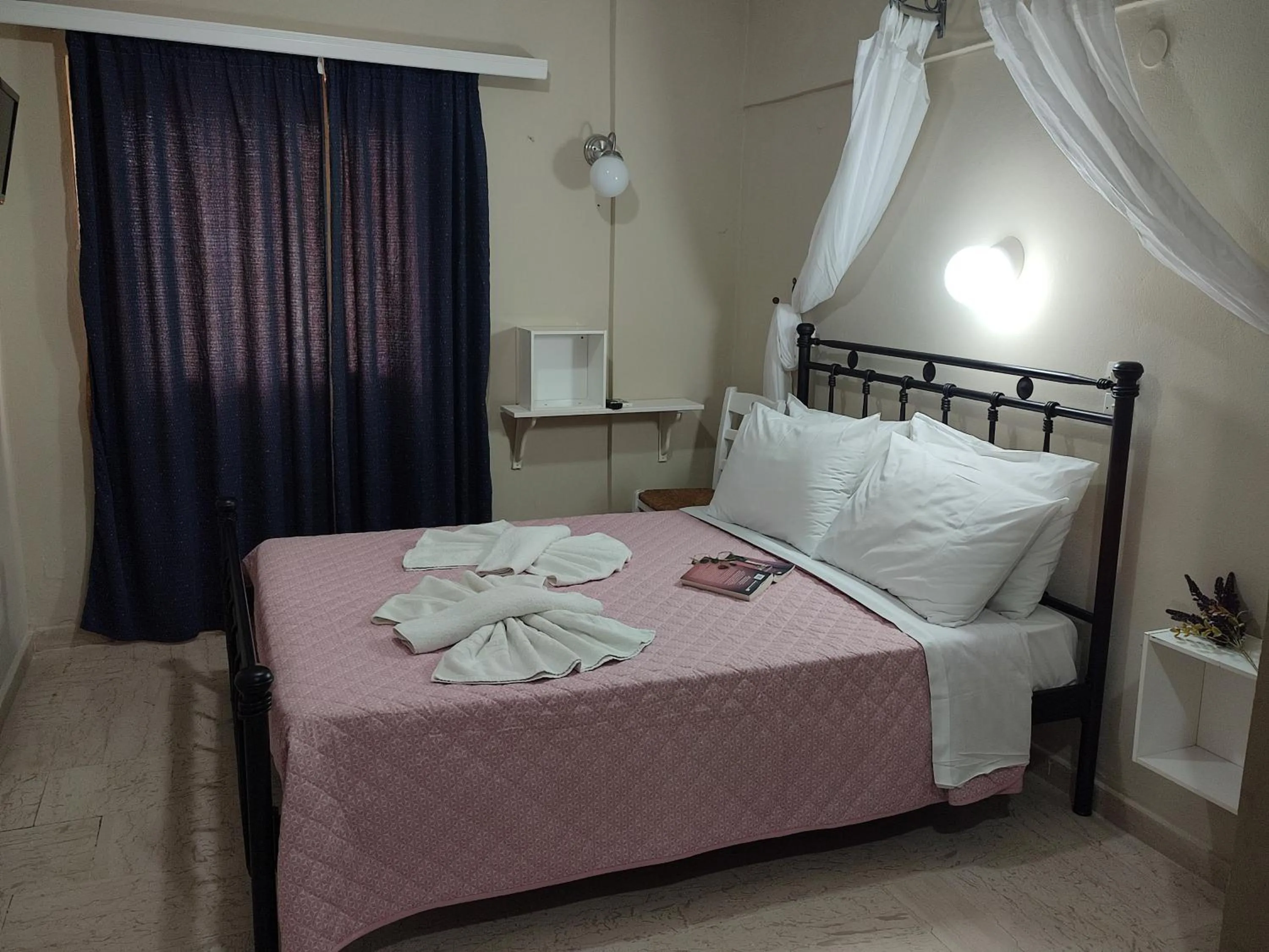 Bed in Vassiliki Bay Hotel