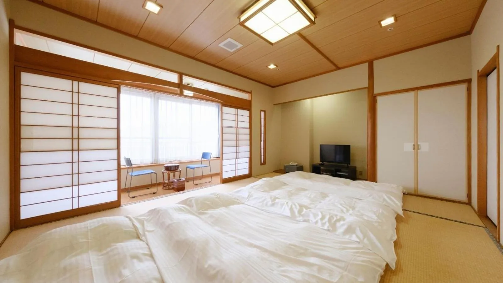 Bed in Sagayamato Onsen Hotel Amandi