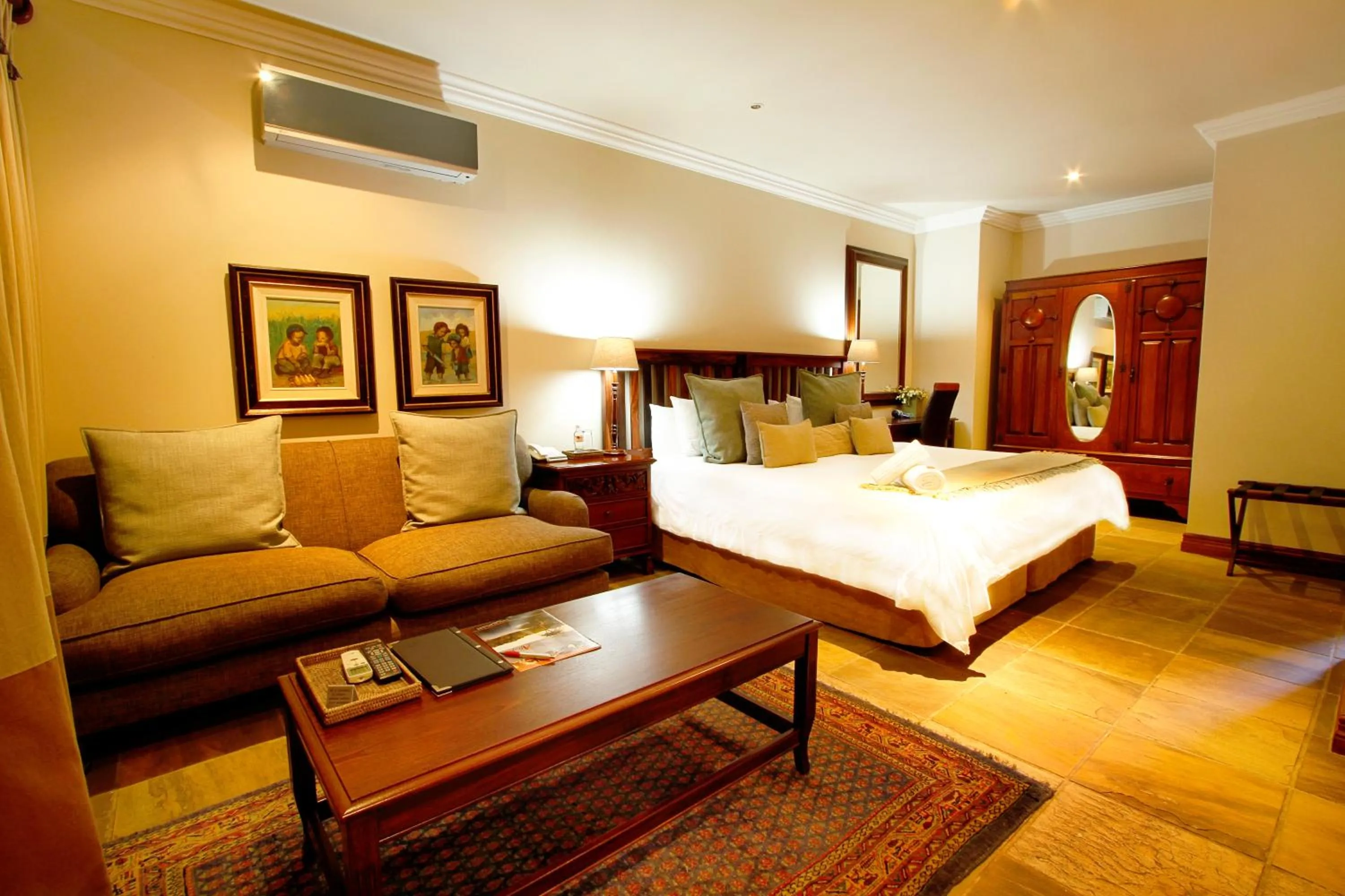 Seating area, Bed in Afrique Boutique Ruimsig