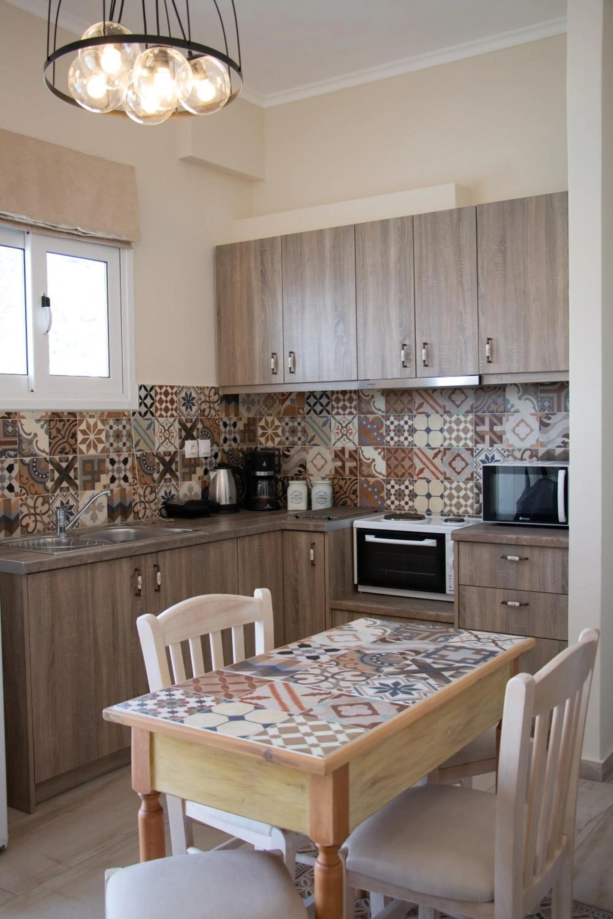 Kitchen or kitchenette in Helen Hotel