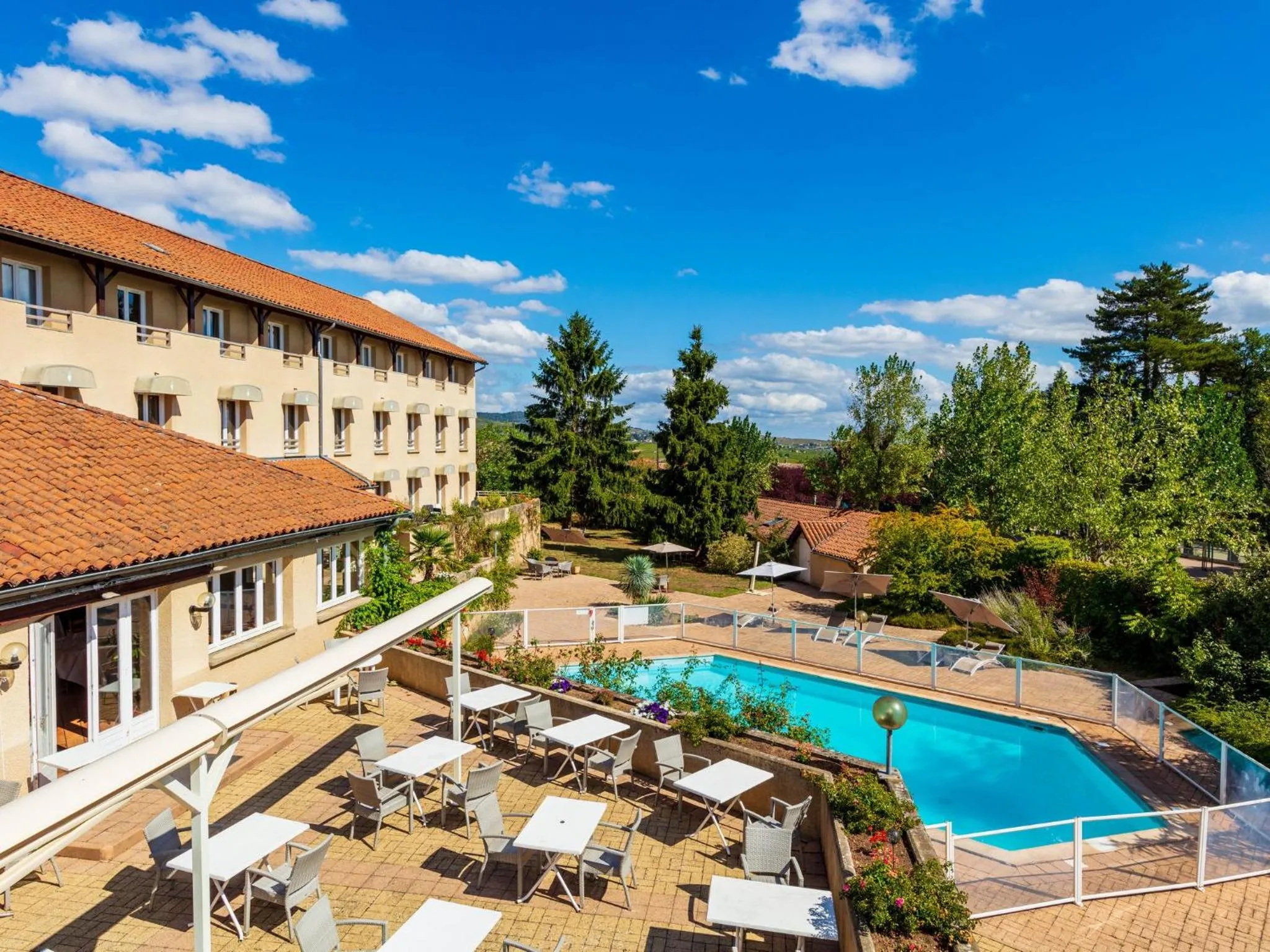 Patio in Logis Hotel Noemys Morgon