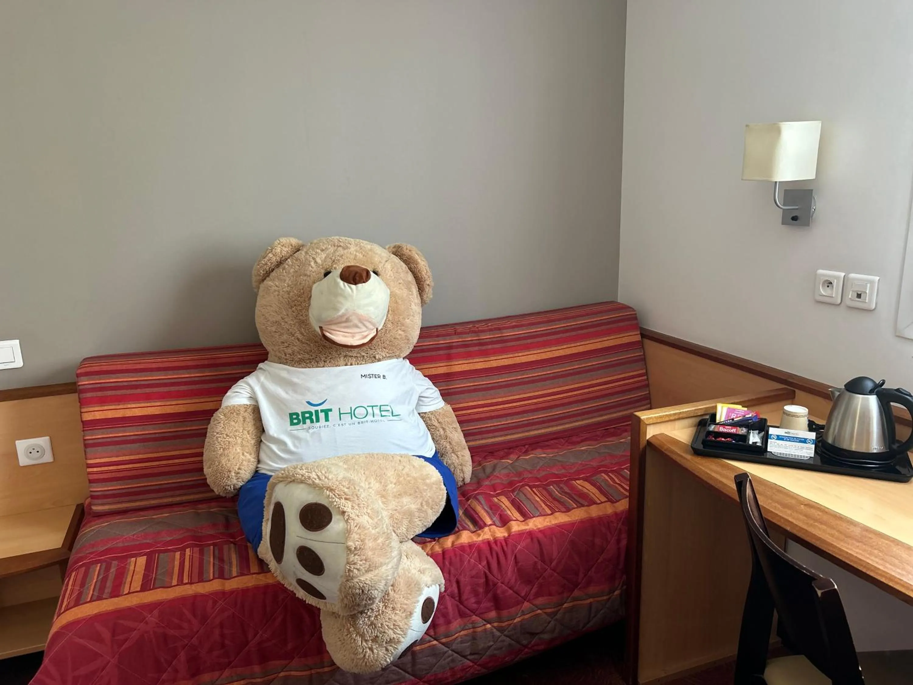 Bedroom in Brit Hotel Confort Montauban