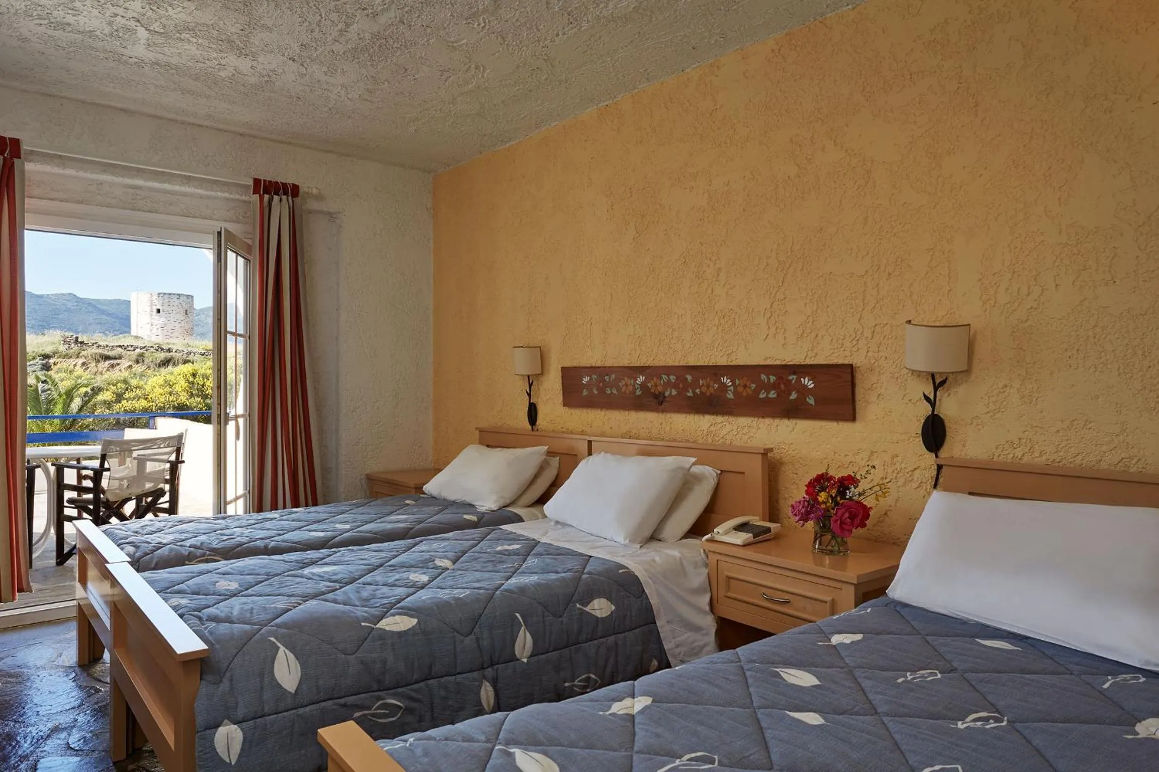 Bedroom in Andros Holiday Hotel