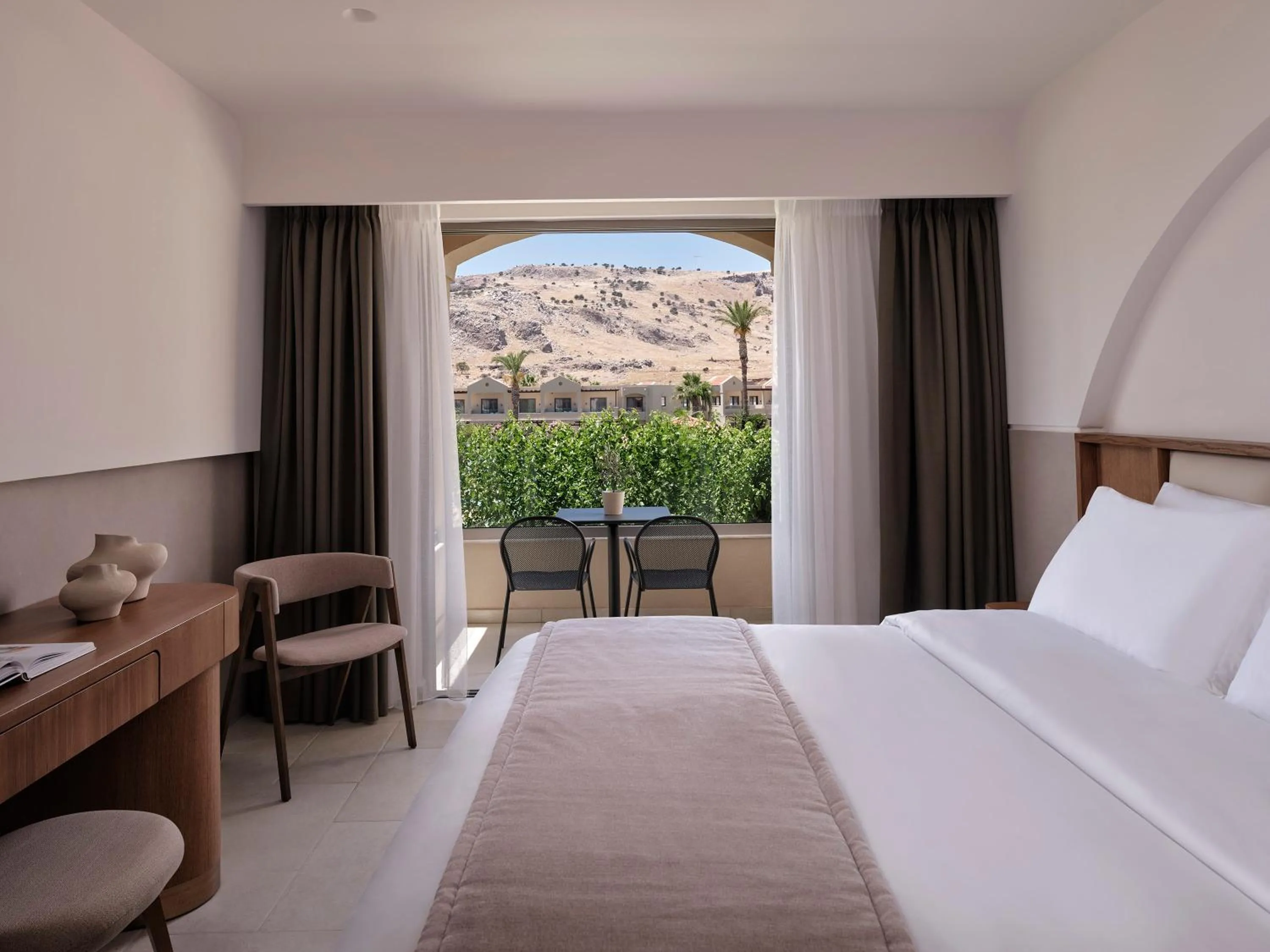 Bed in Lindos Princess Beach Hotel