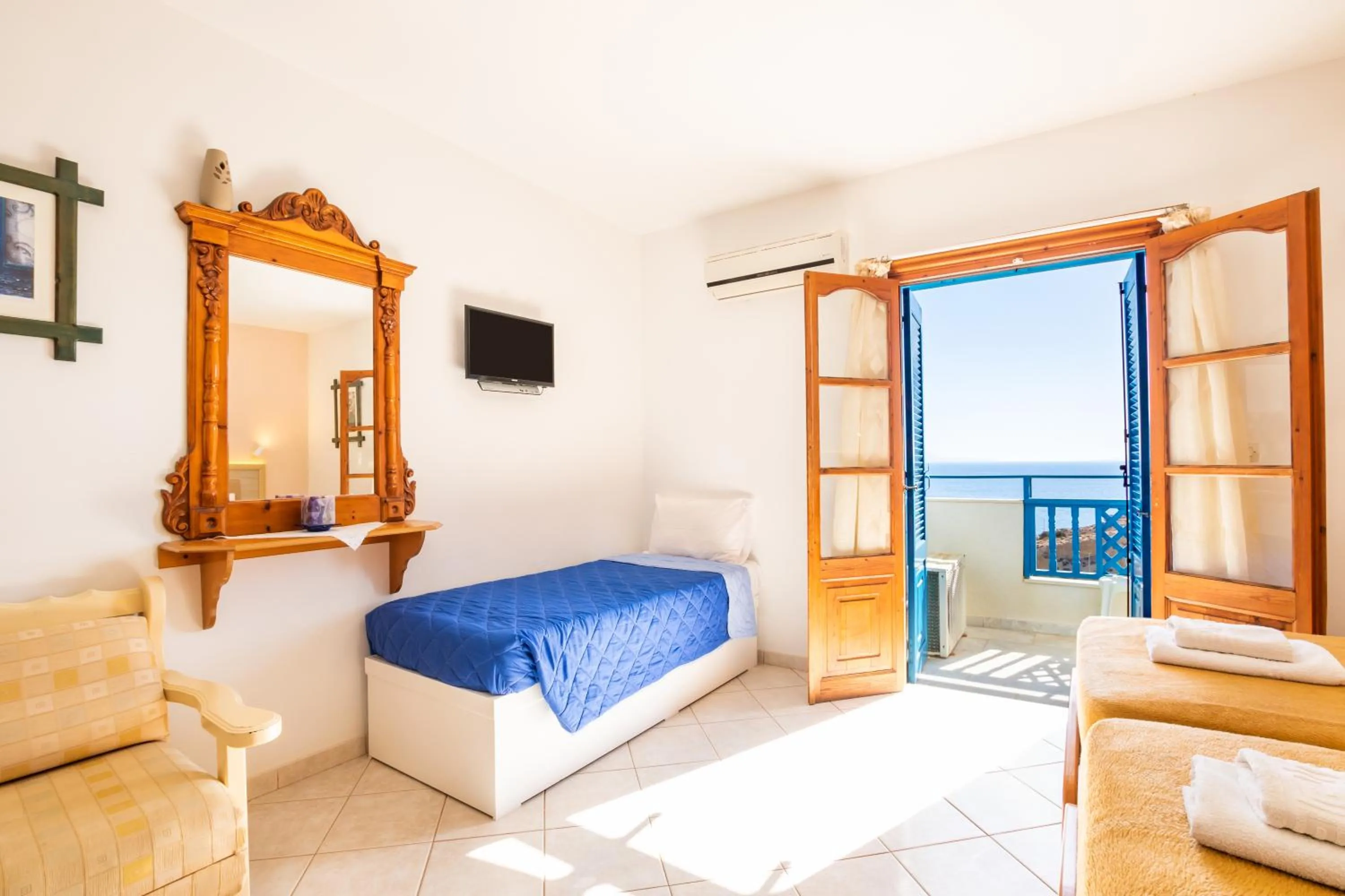 Bed in Arhontiko Hotel