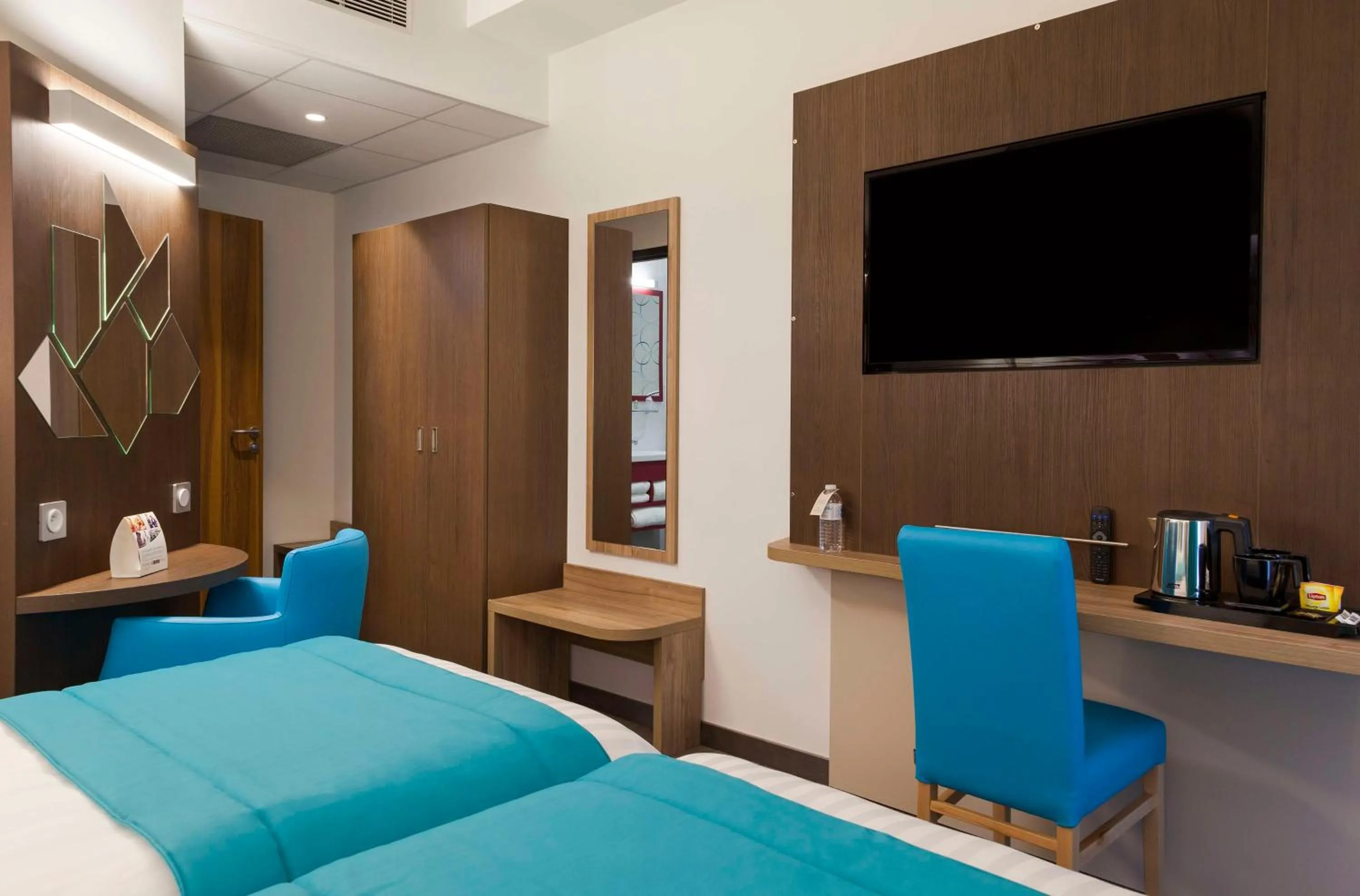 Bedroom, Bed in Brit Hotel Privilège Figeac