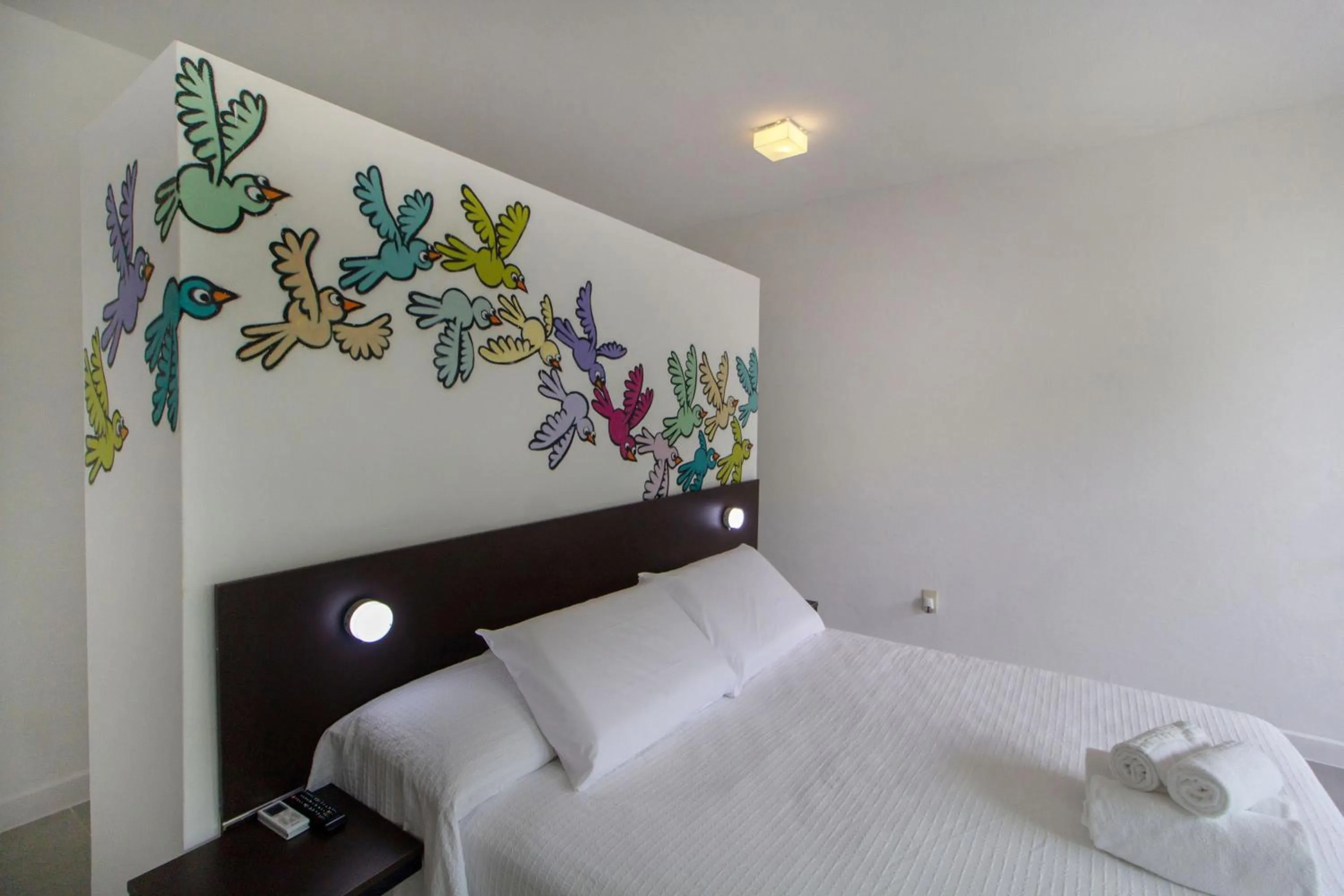 Bed in Villa dos Graffitis Pousada