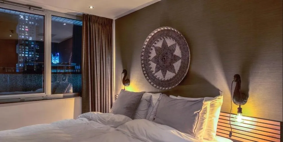 Bed in Boutique Hotel Lumiere