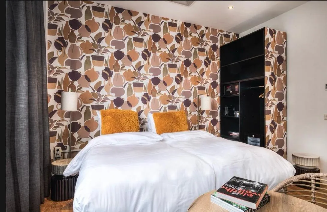 Bed in Boutique Hotel Lumiere