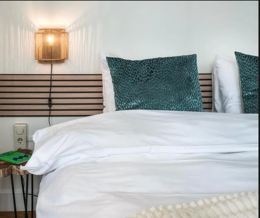 Bed in Boutique Hotel Lumiere