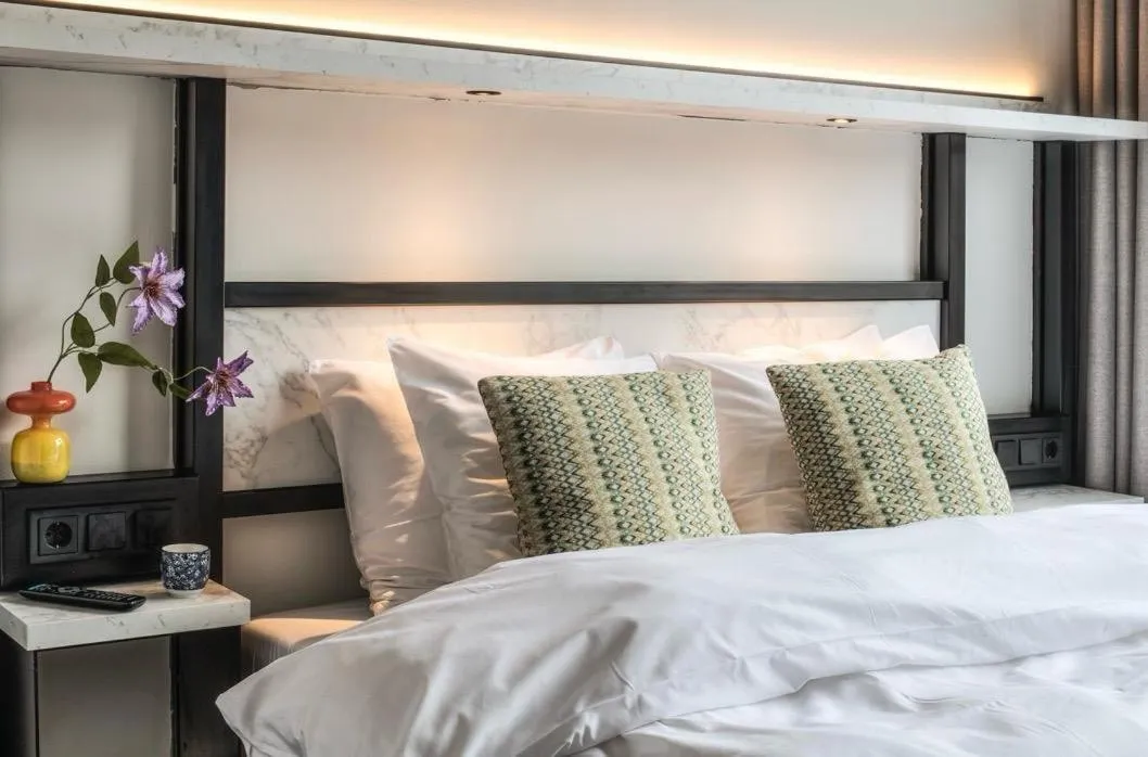 Bed in Boutique Hotel Lumiere