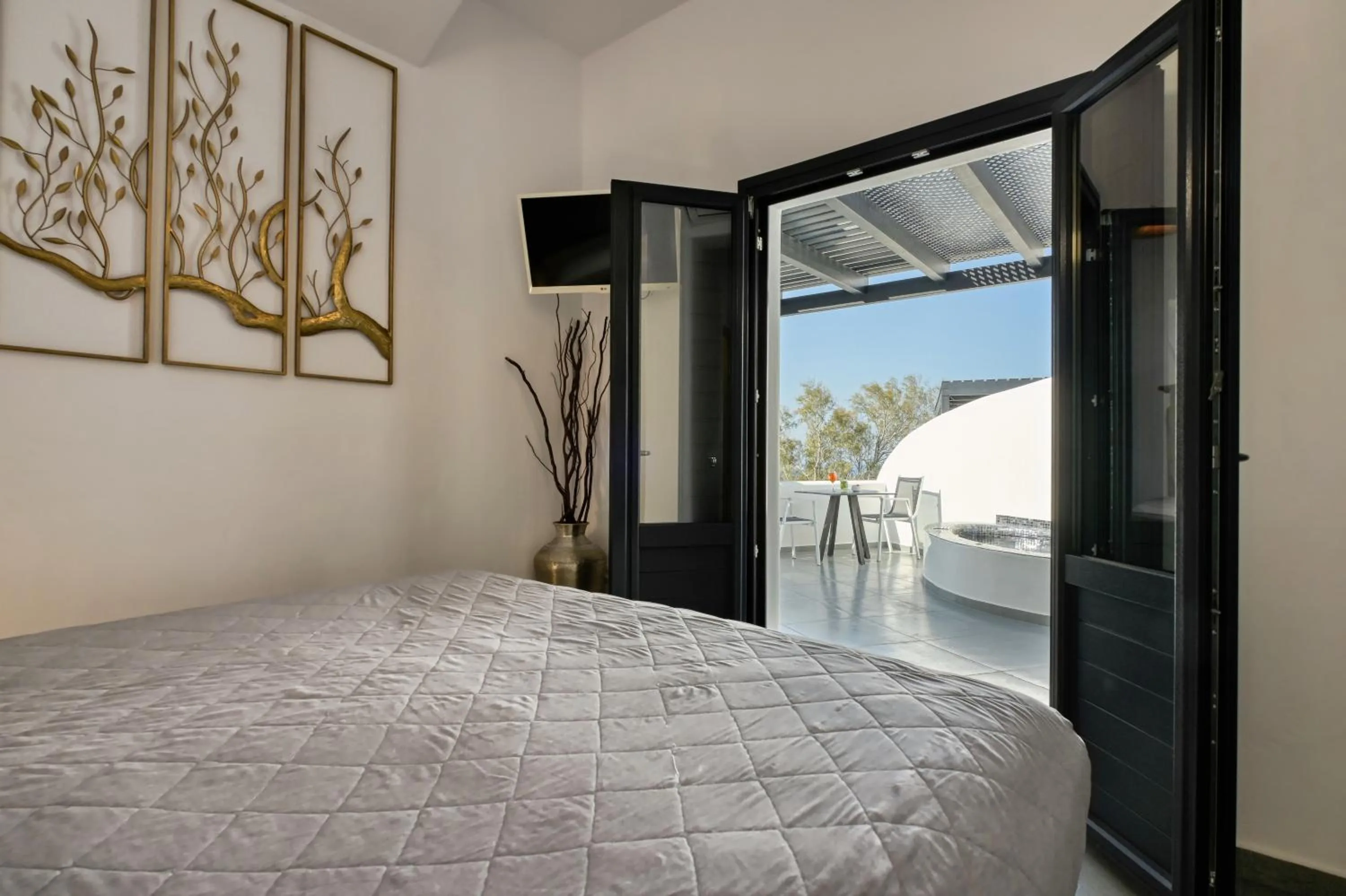 Bed in Oia Suites