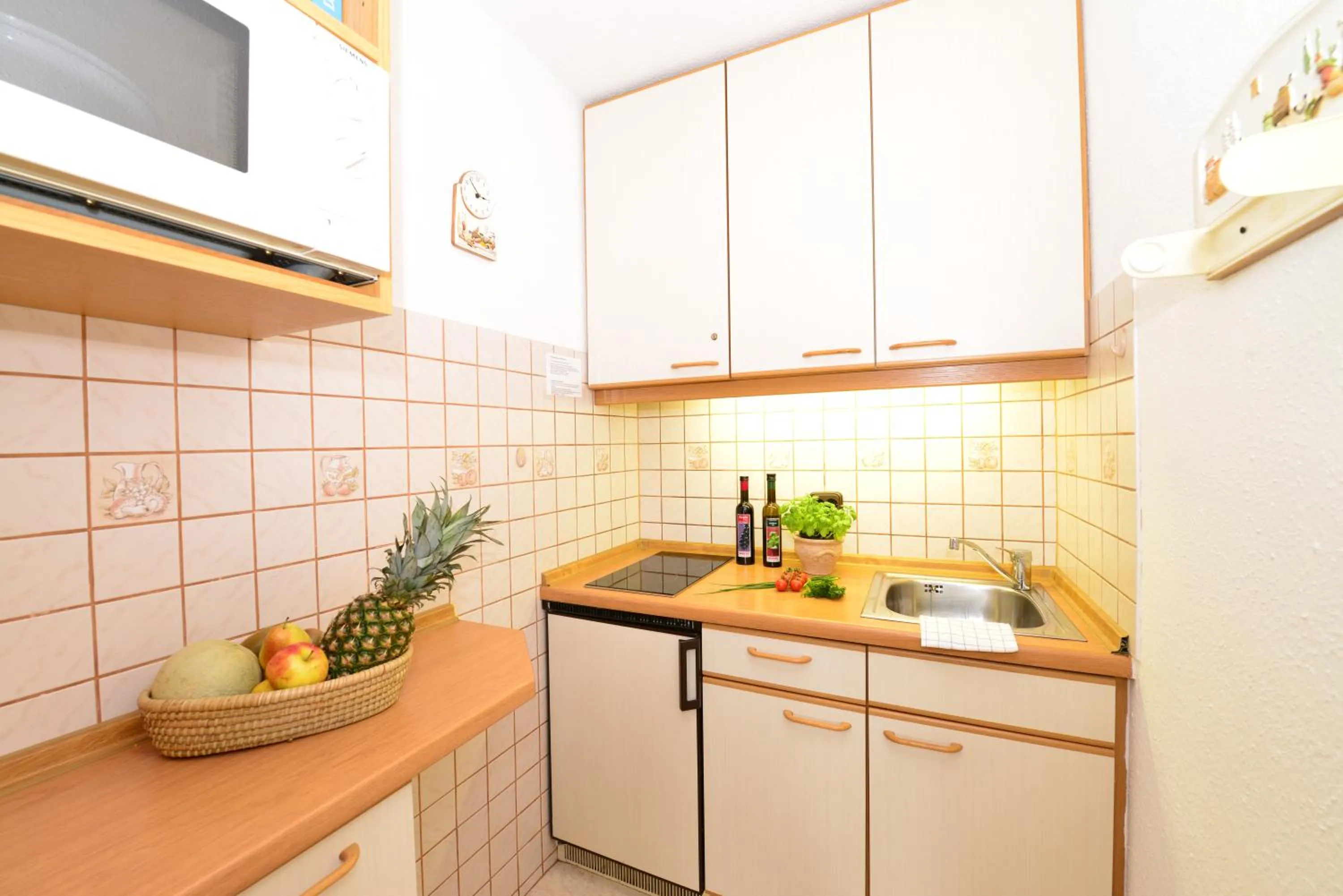 Kitchen or kitchenette in Familienhotel Kleinwalsertal