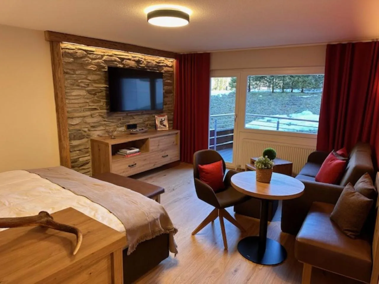 Seating area, Bed in Familienhotel Kleinwalsertal