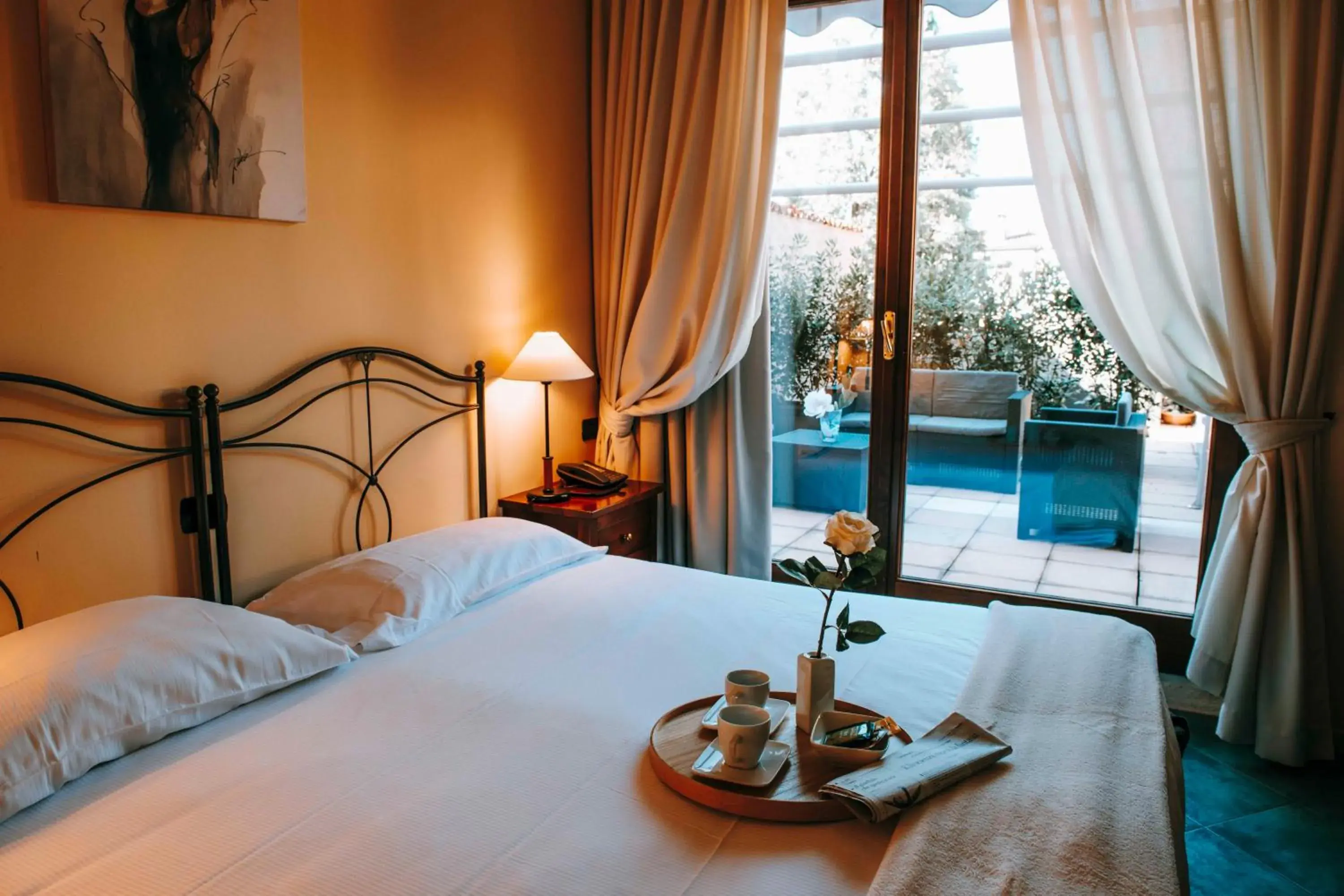 Quadruple Room with Balcony in Hotel La Contrada Quadruple Room with Balcony in Hotel La Contrada