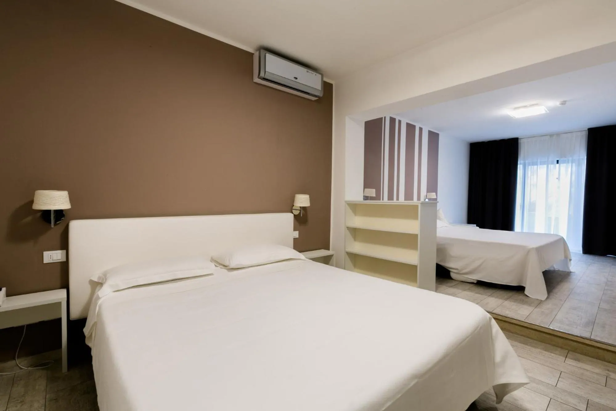 Bed in Hotel Saviola