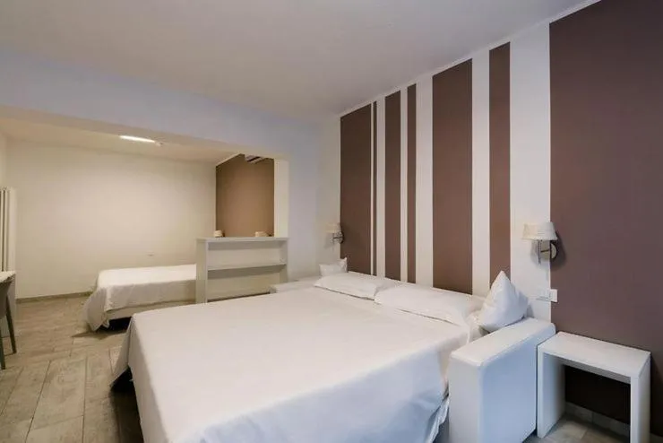 Bed in Hotel Saviola