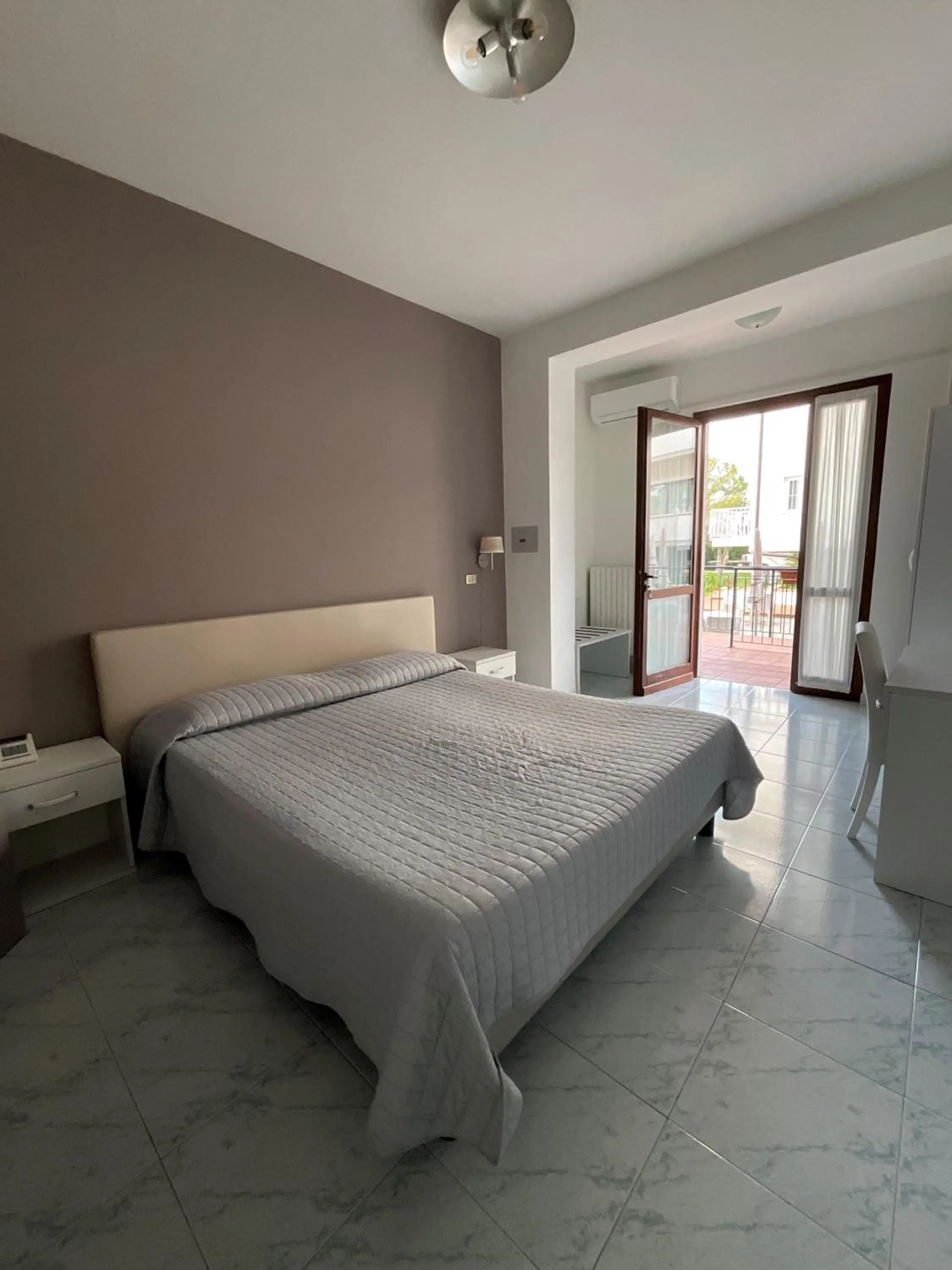 Bed in Hotel Saviola