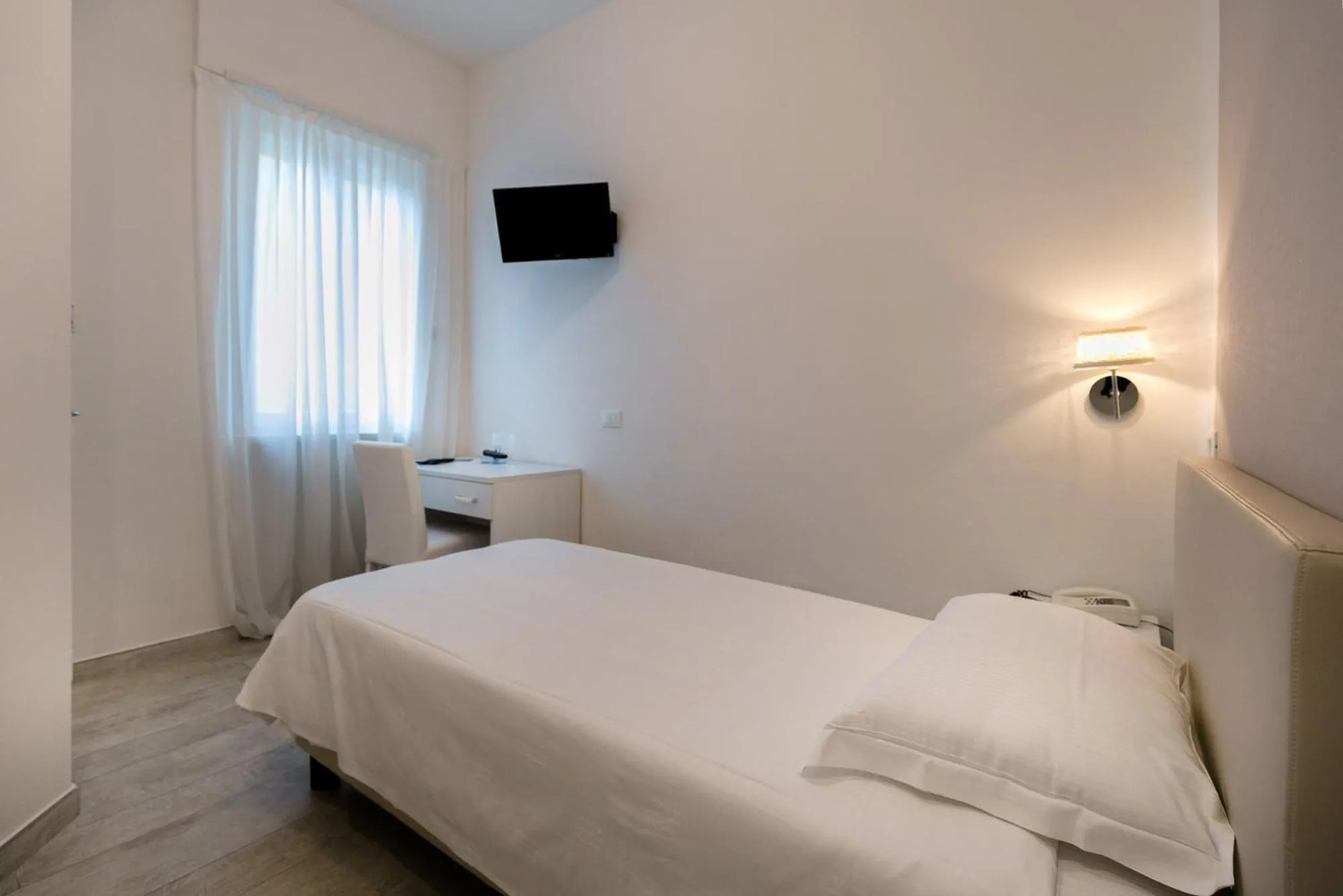 Bed in Hotel Saviola