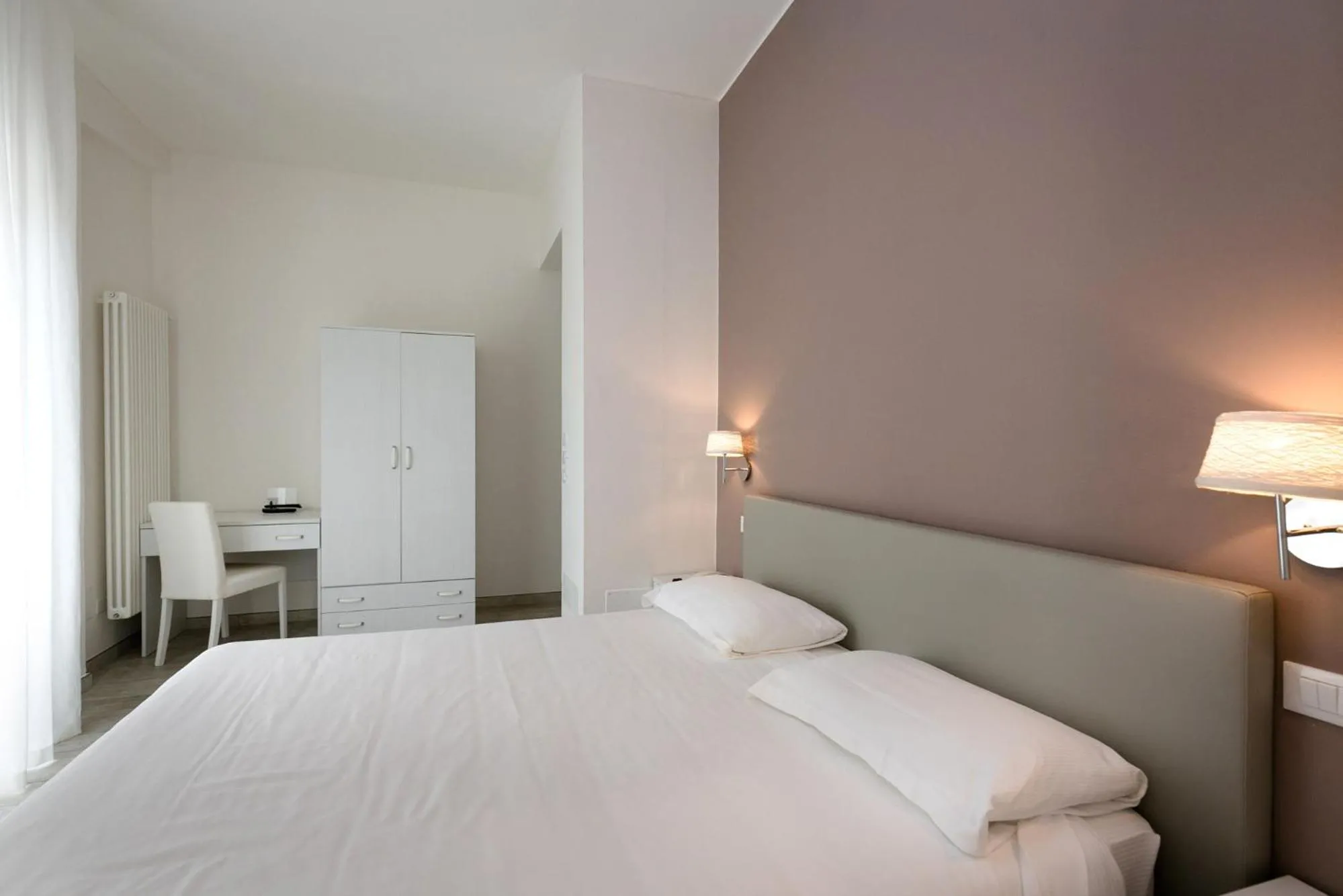 Bed in Hotel Saviola