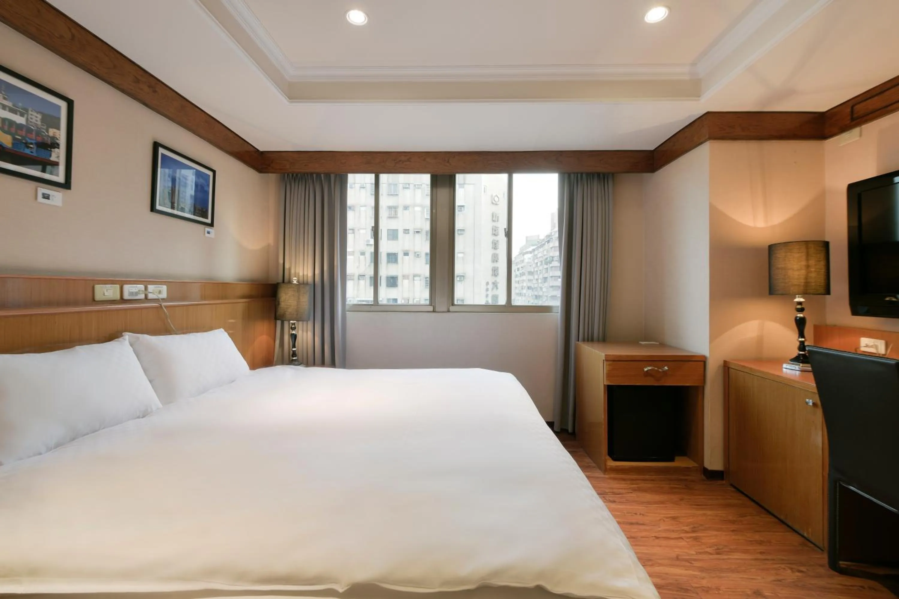 Bed in The Rivero Hotel