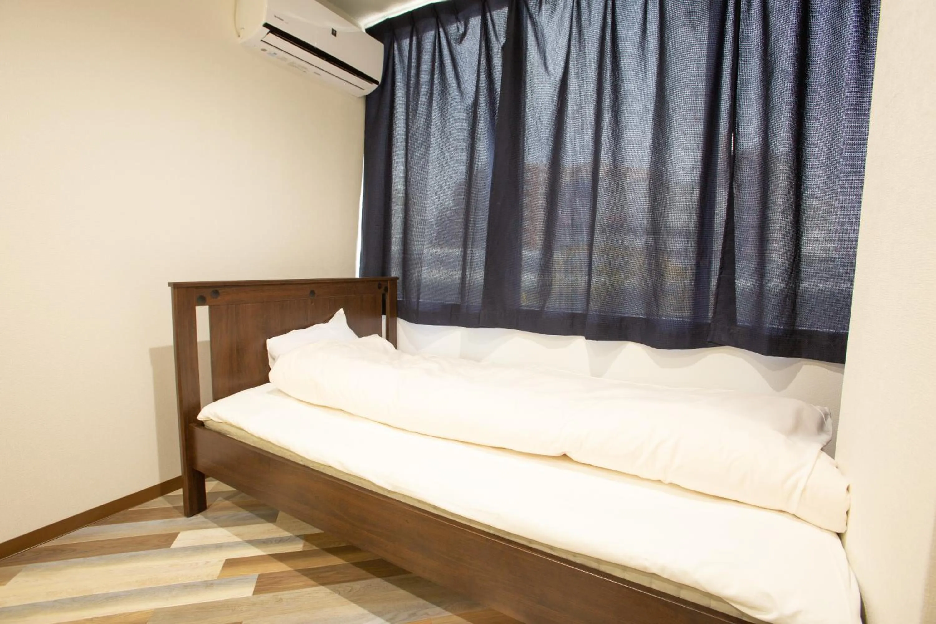 Bed in 123 Guesthouse