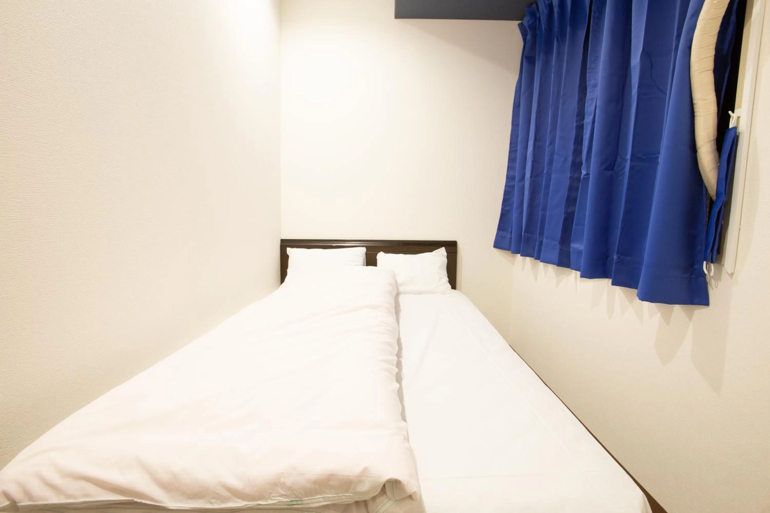 Bed in 123 Guesthouse