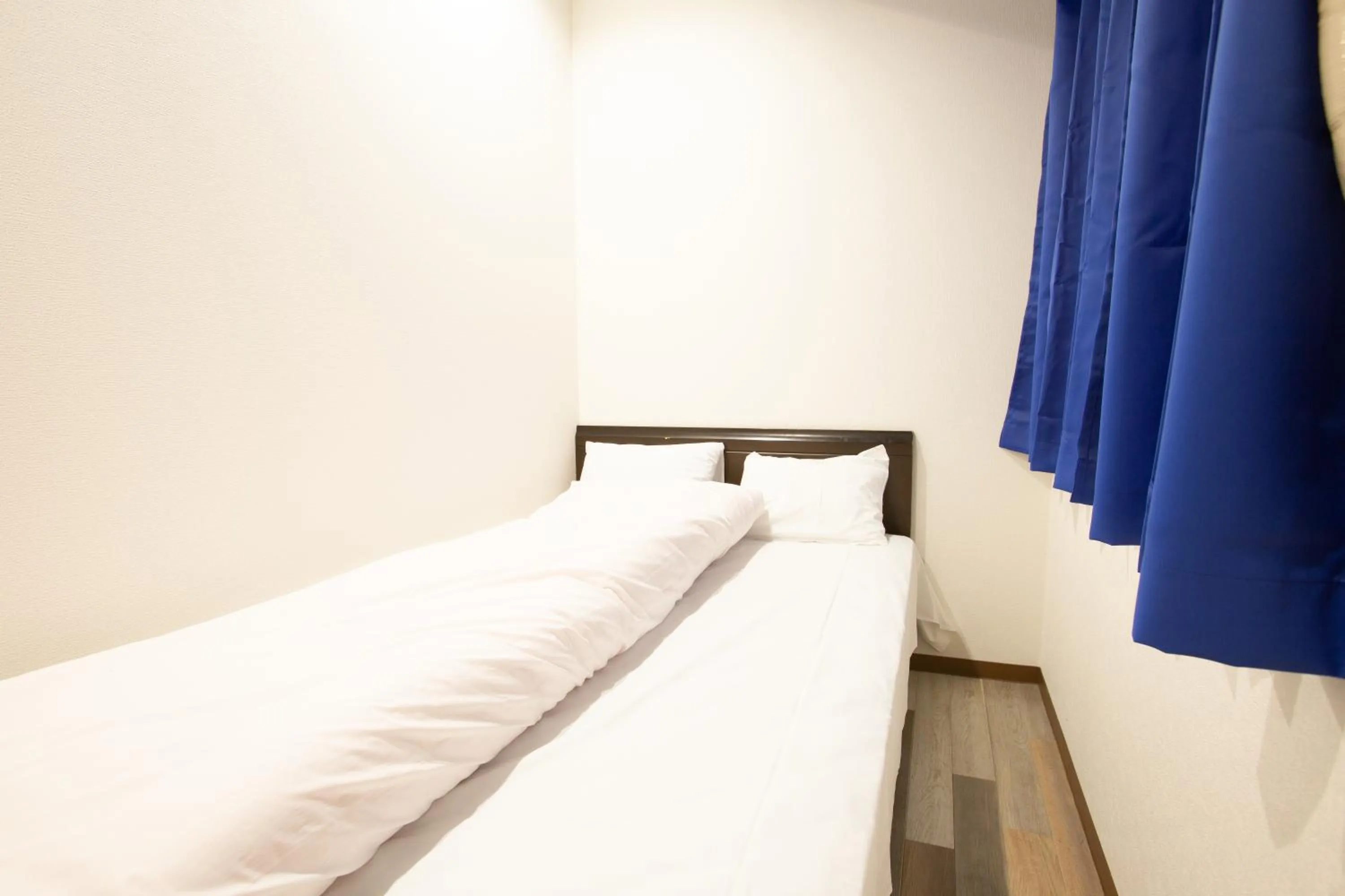 Bed in 123 Guesthouse