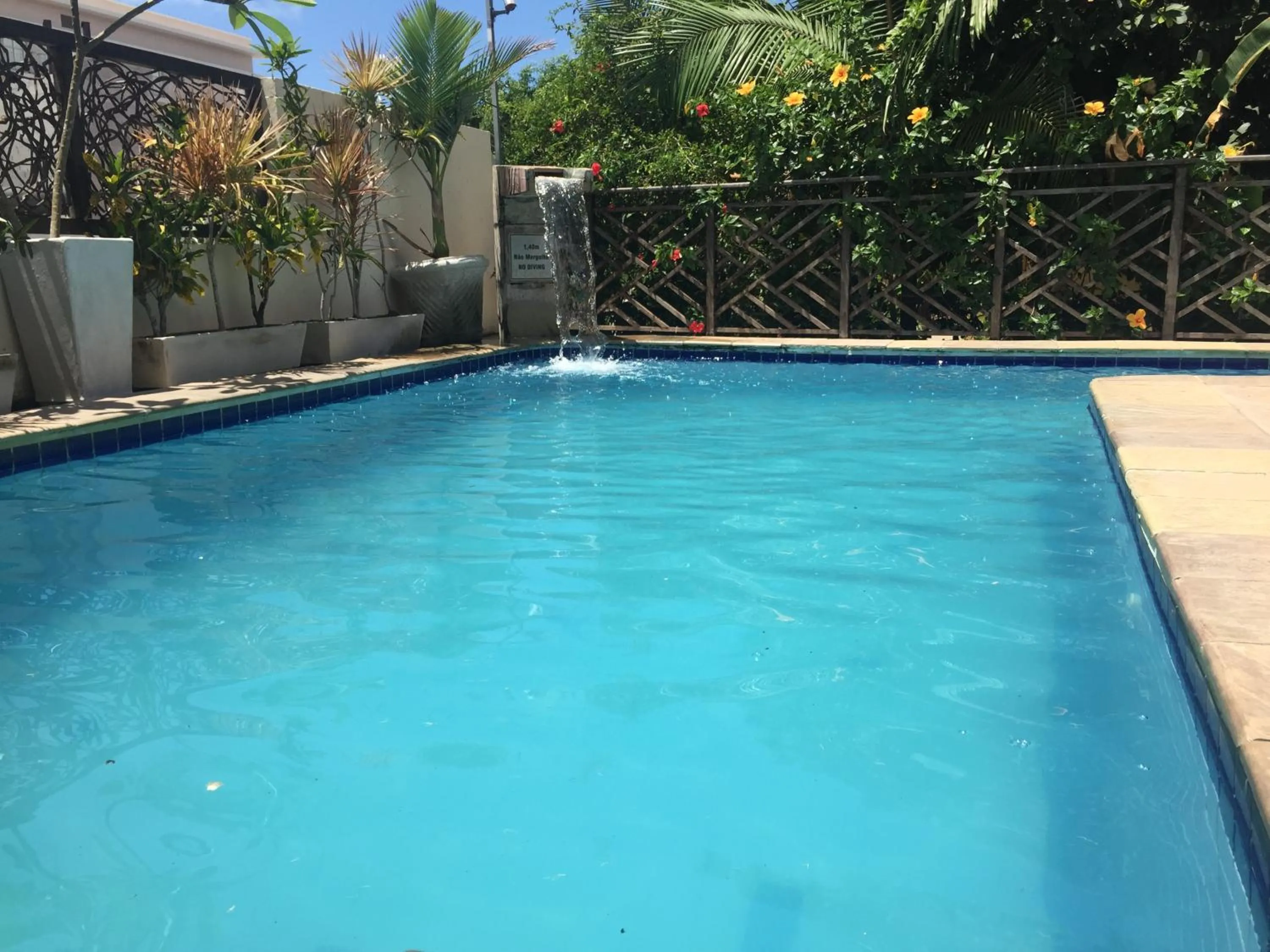 Swimming pool in Hotel Aconchego Porto de Galinhas