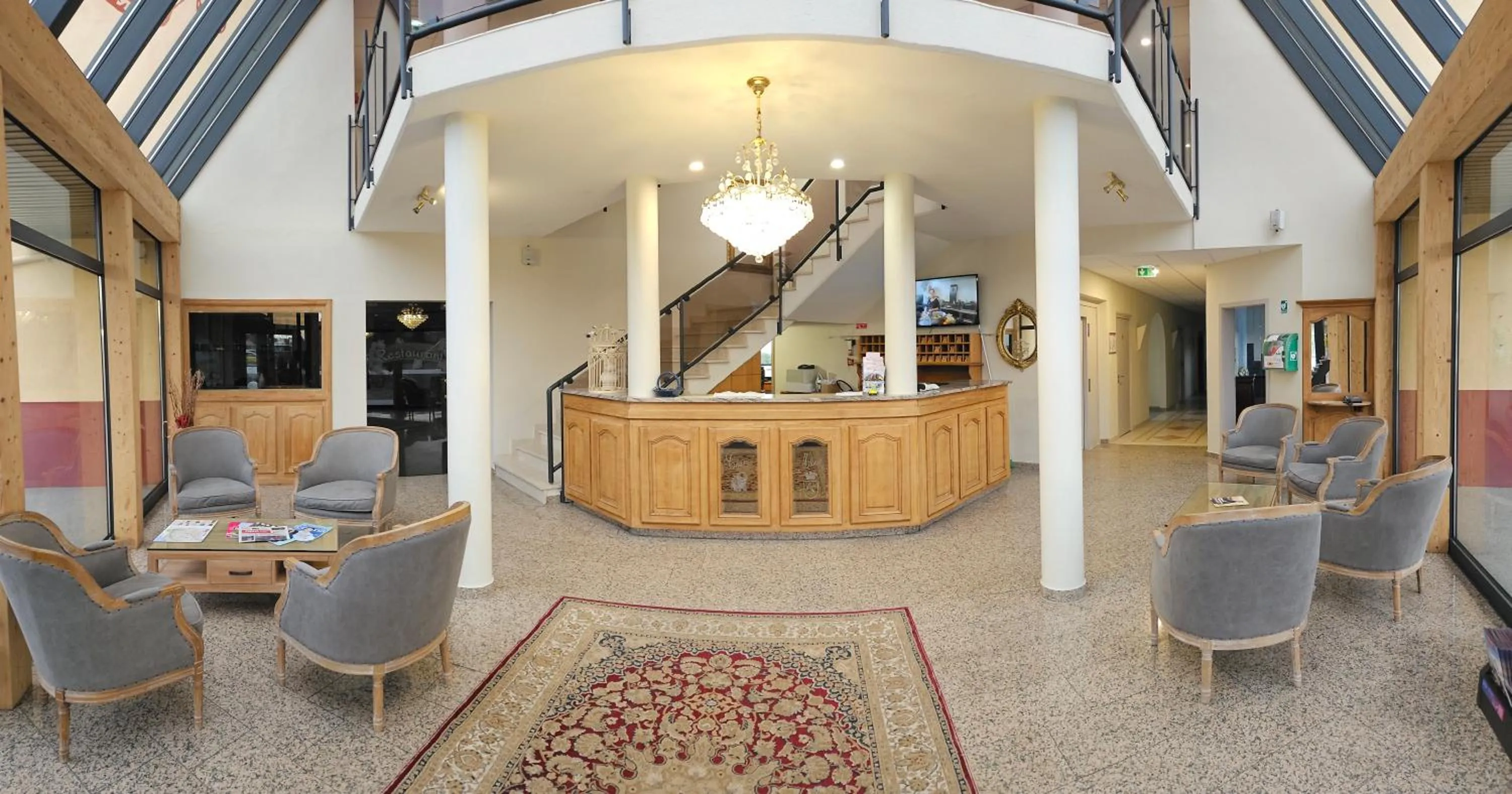 Seating area in Hotel Restaurant Champ Alsace
